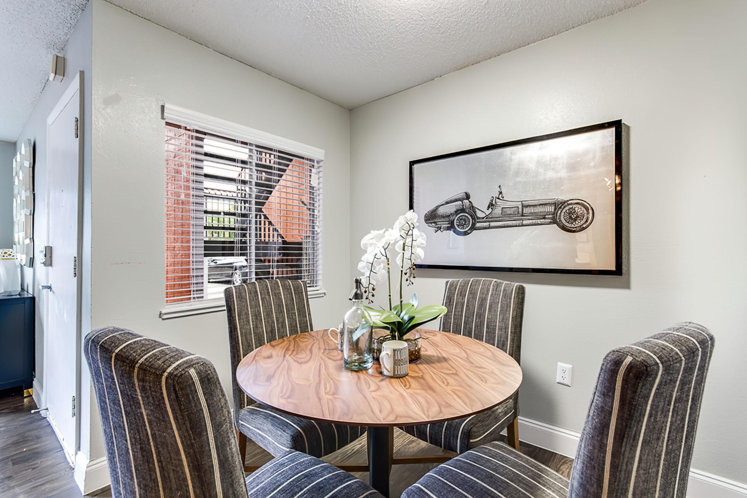 a living room with a leather chair