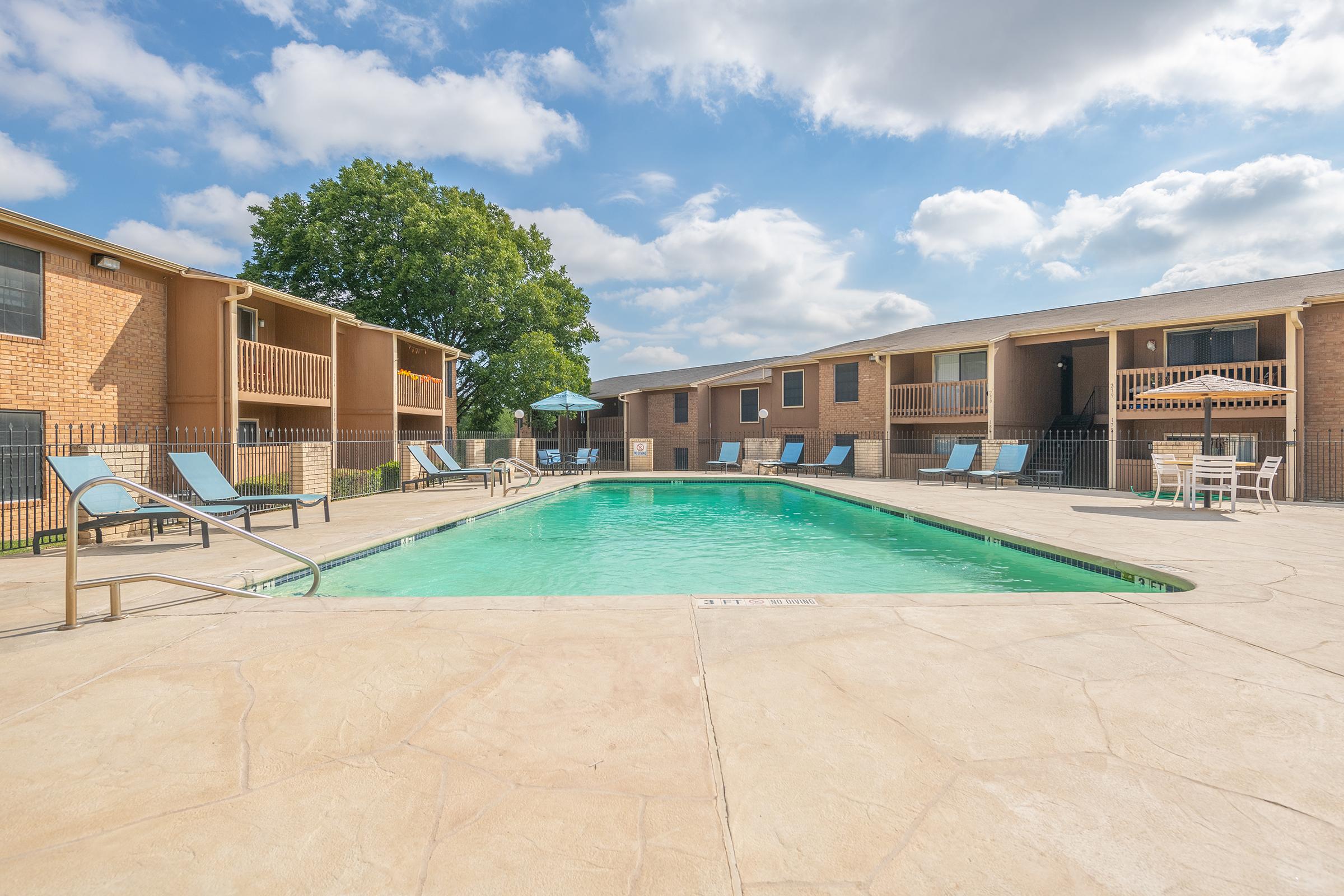 a pool next to a building