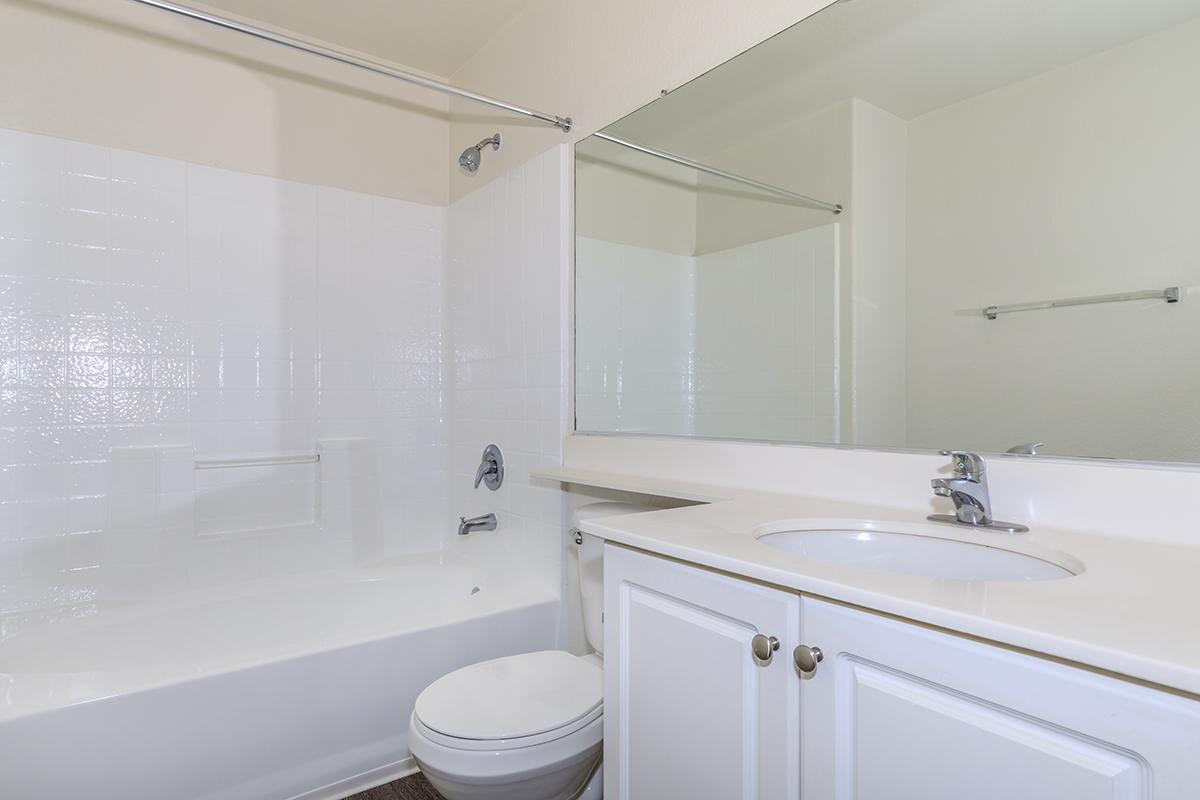 Unfurnished bathroom with white countertops