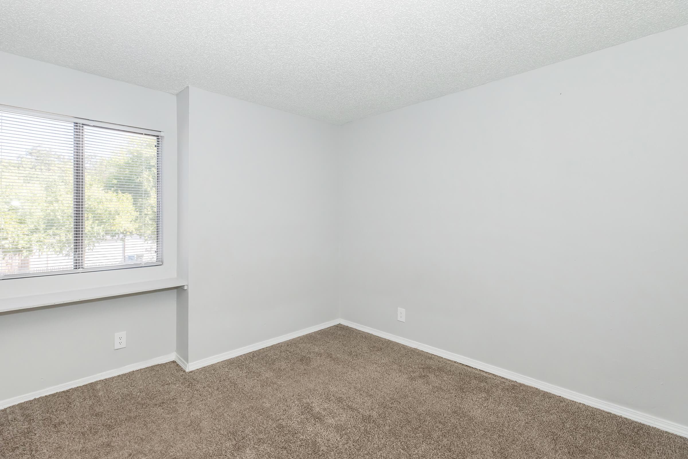 a room with a sink and a window