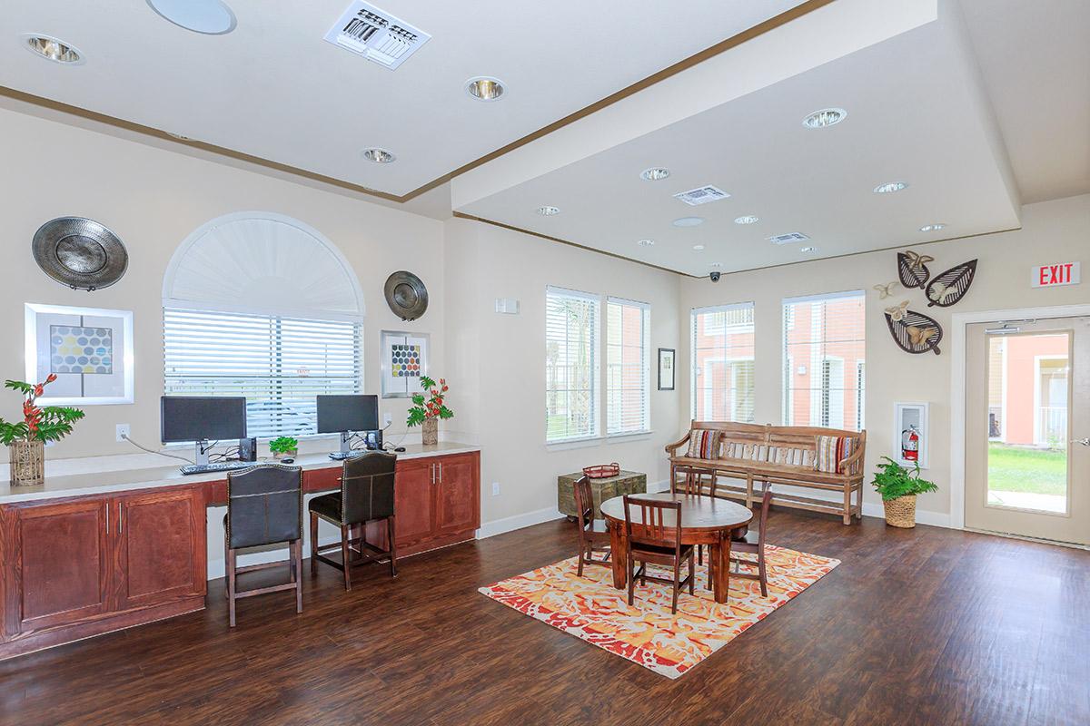 a living room filled with furniture and a fireplace