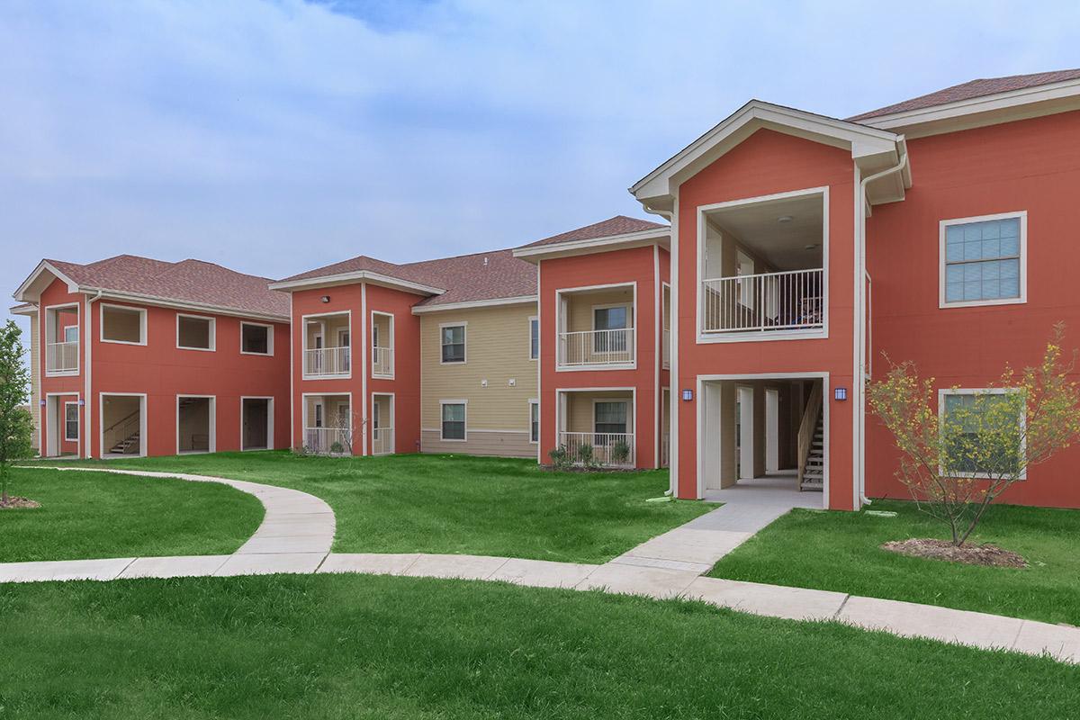 a large lawn in front of a house