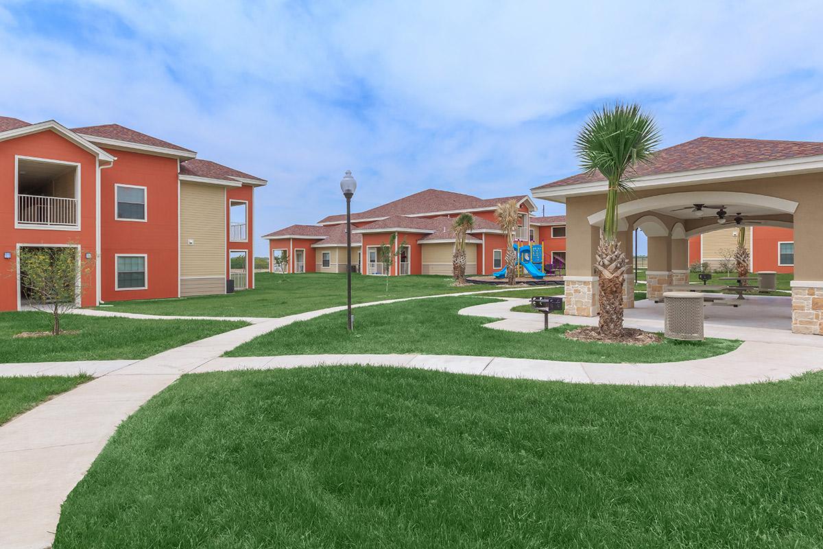 a large lawn in front of a house