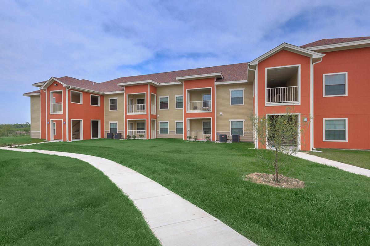 a large lawn in front of a house