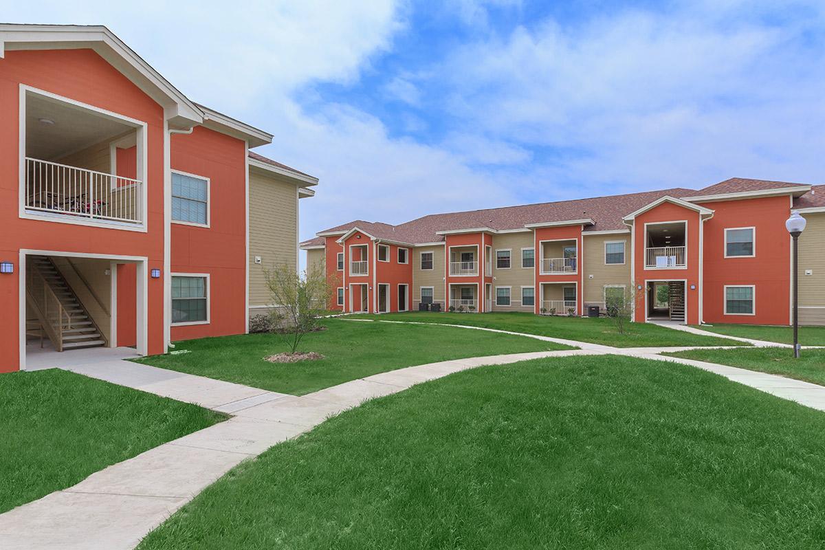 a large lawn in front of a house