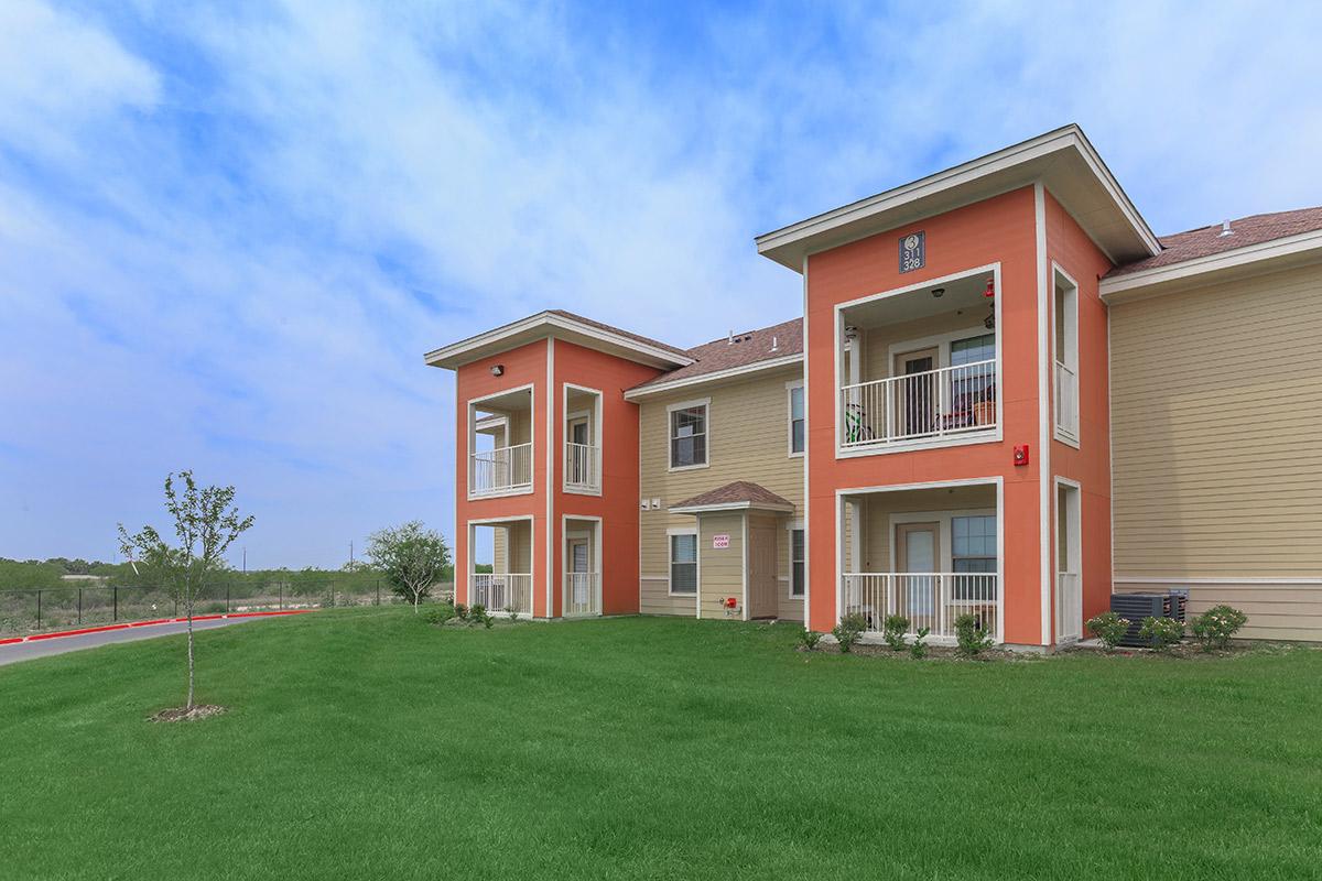 a large lawn in front of a house