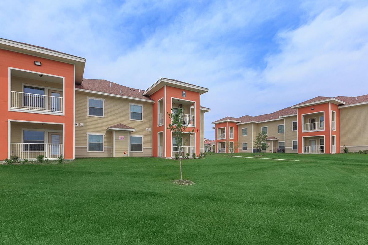 a large lawn in front of a house