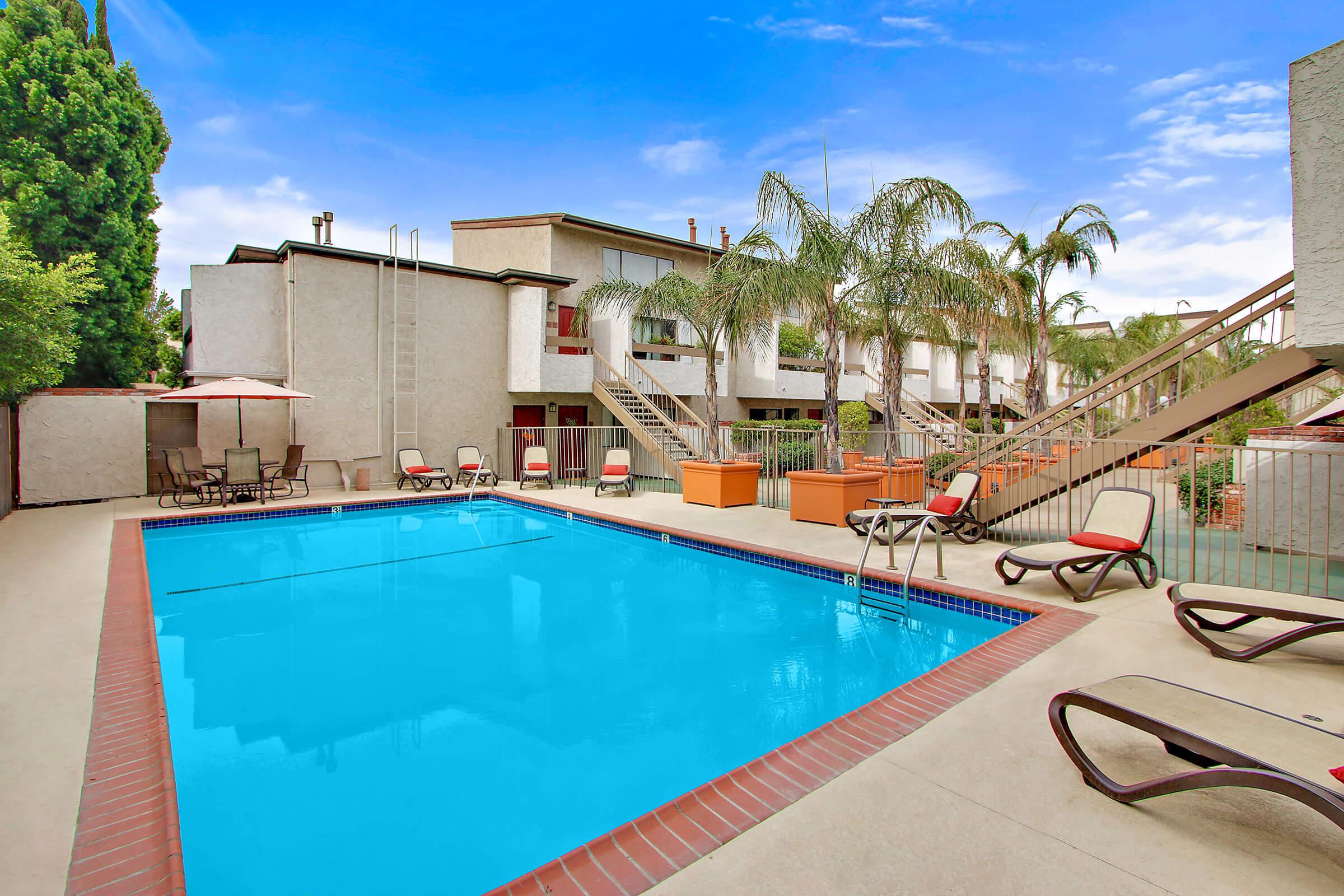 a pool next to a building