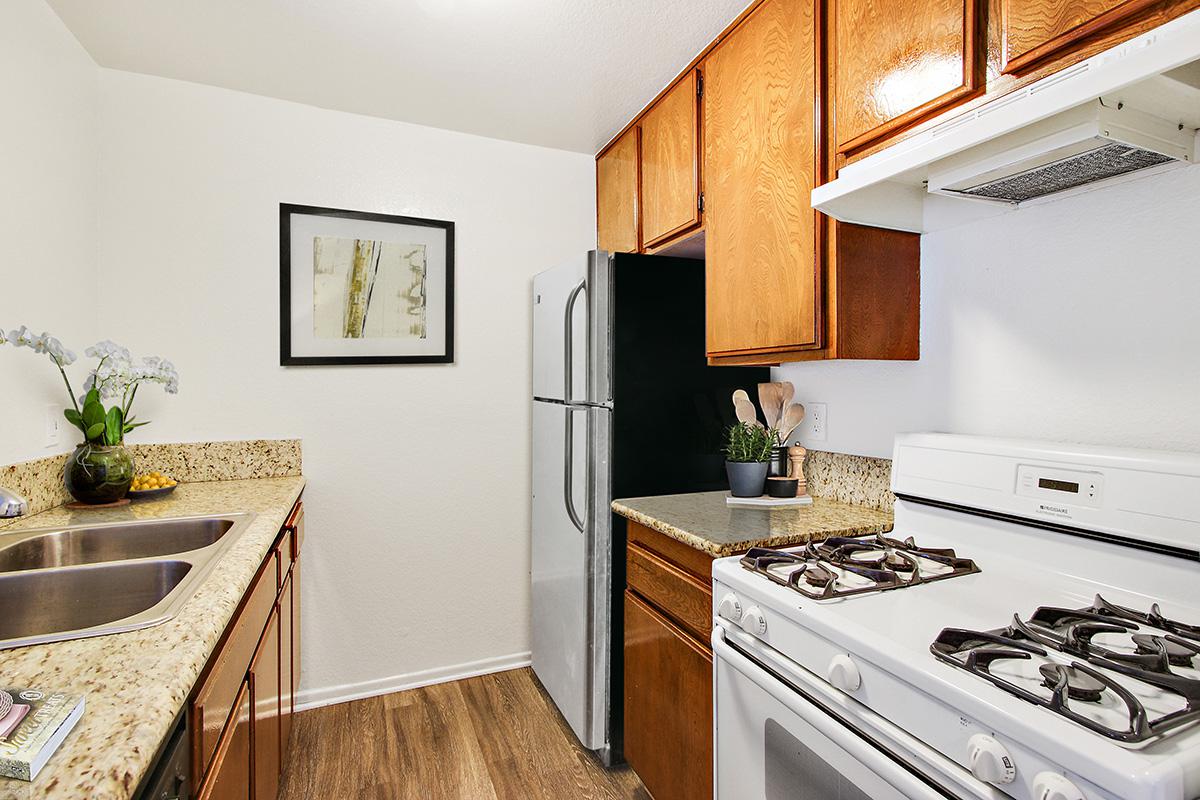 a modern kitchen with stainless steel appliances