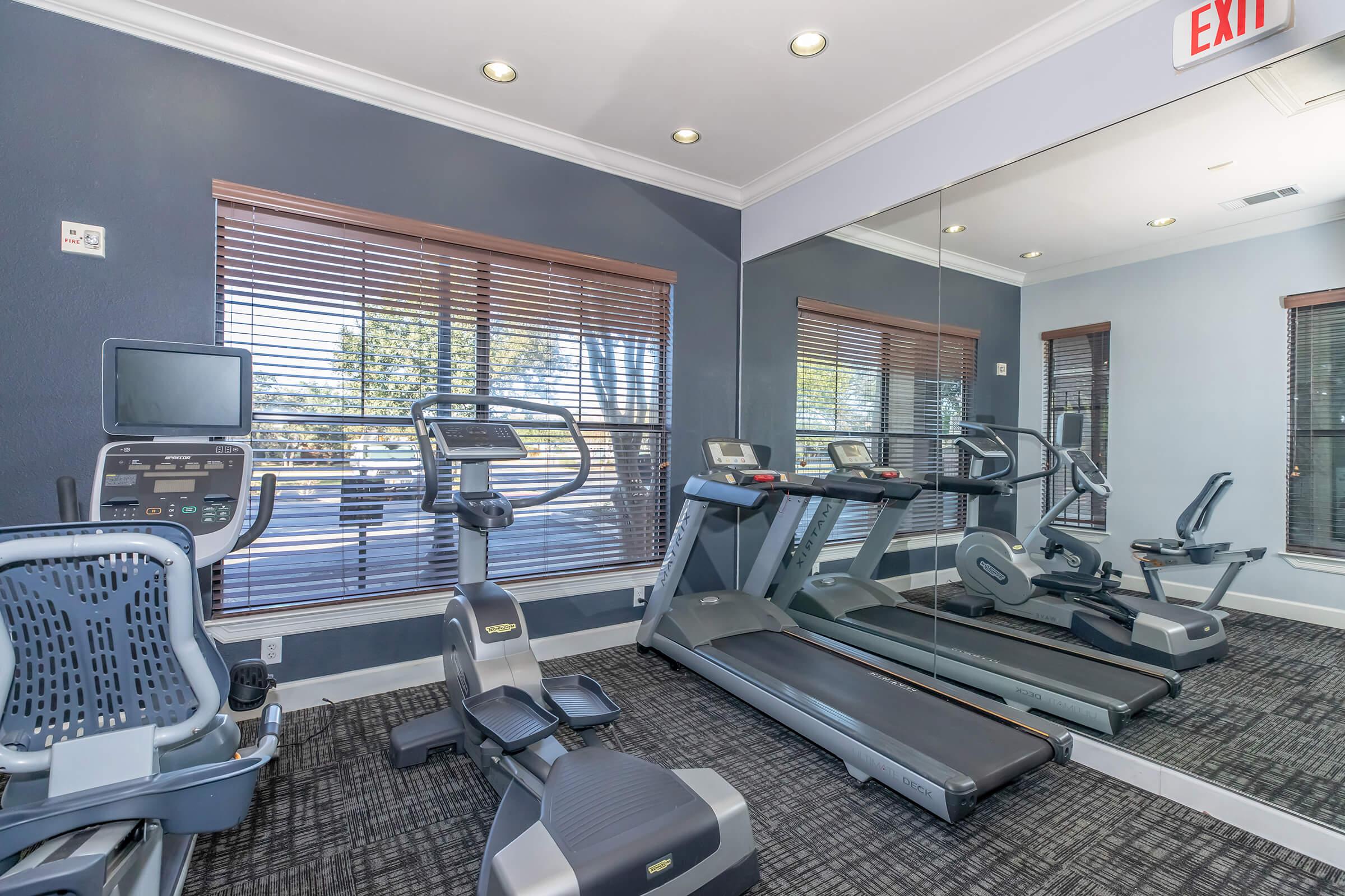 a room filled with furniture and a flat screen tv