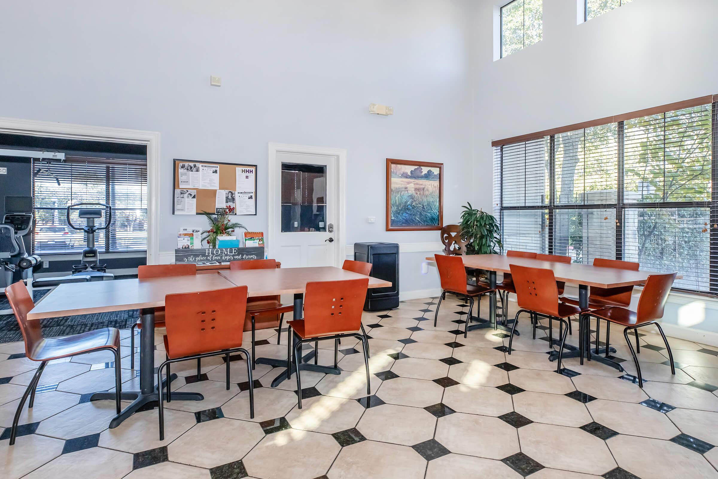 a room filled with furniture and a table