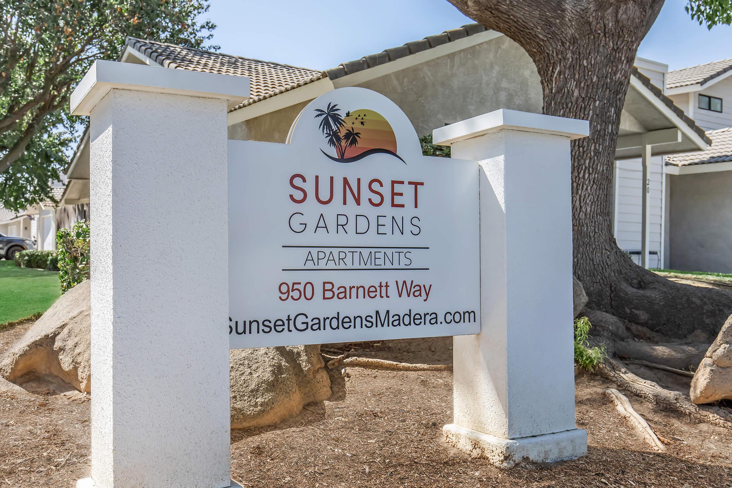 a sign in front of a house