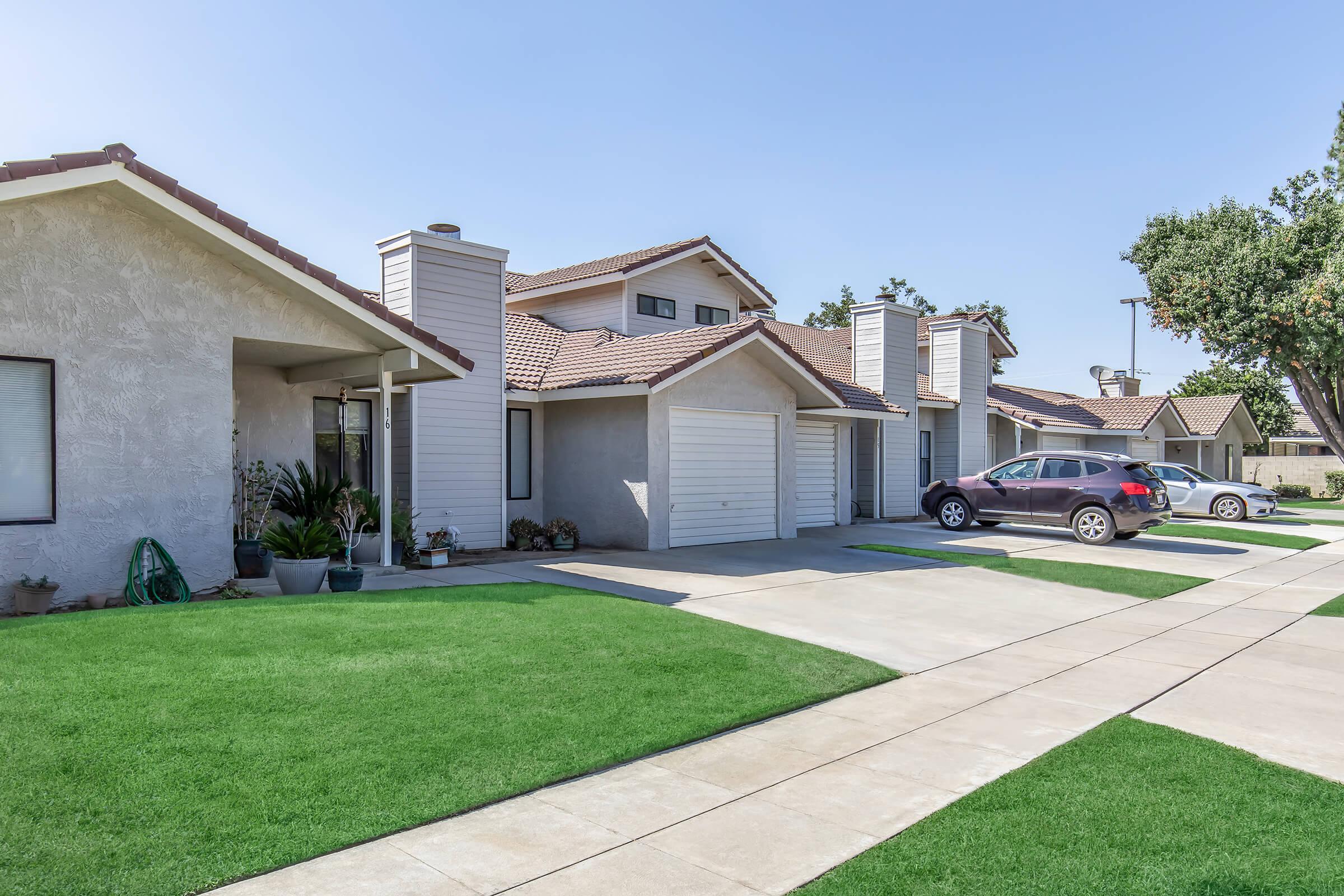 a large lawn in front of a house