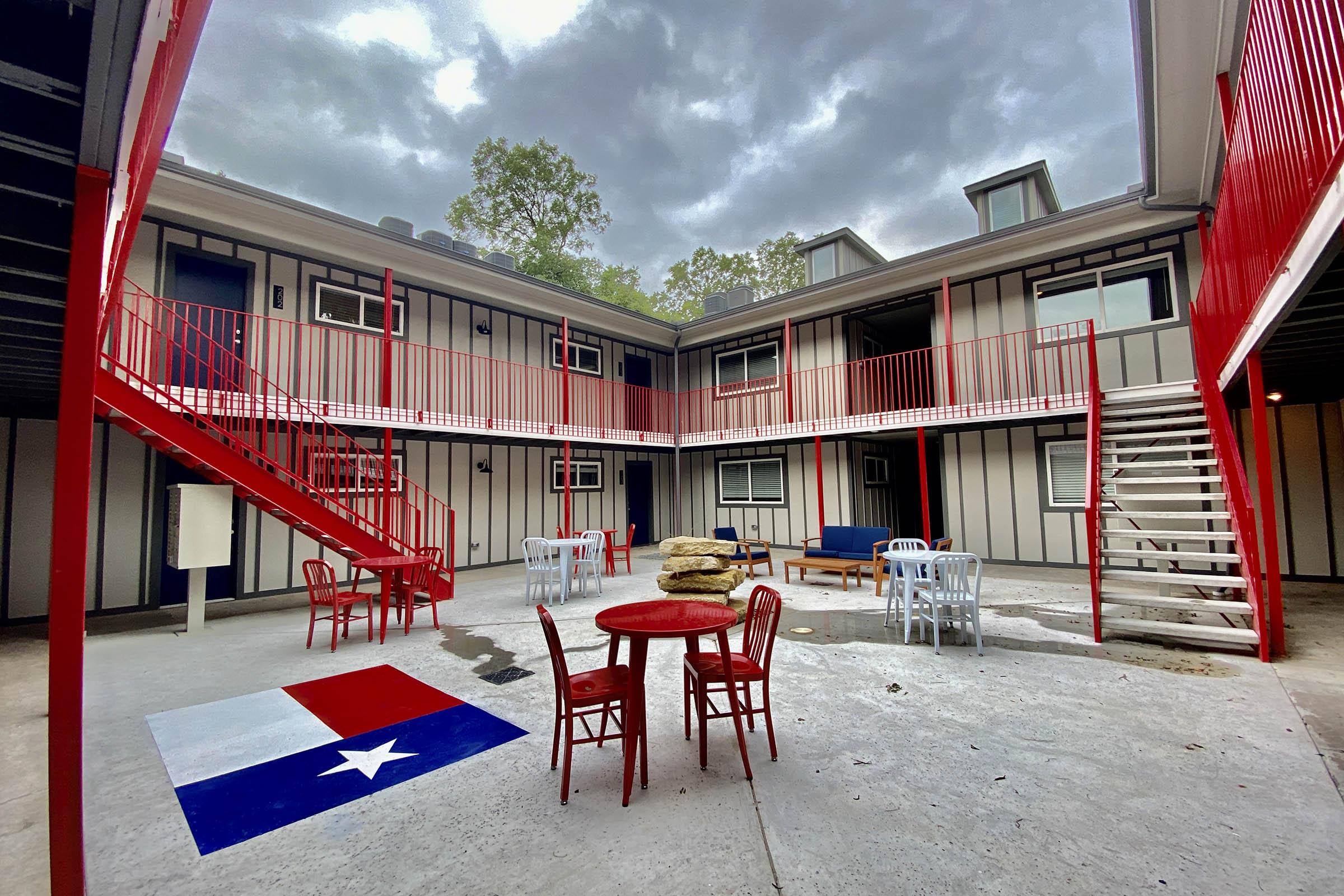 red chairs in the community area