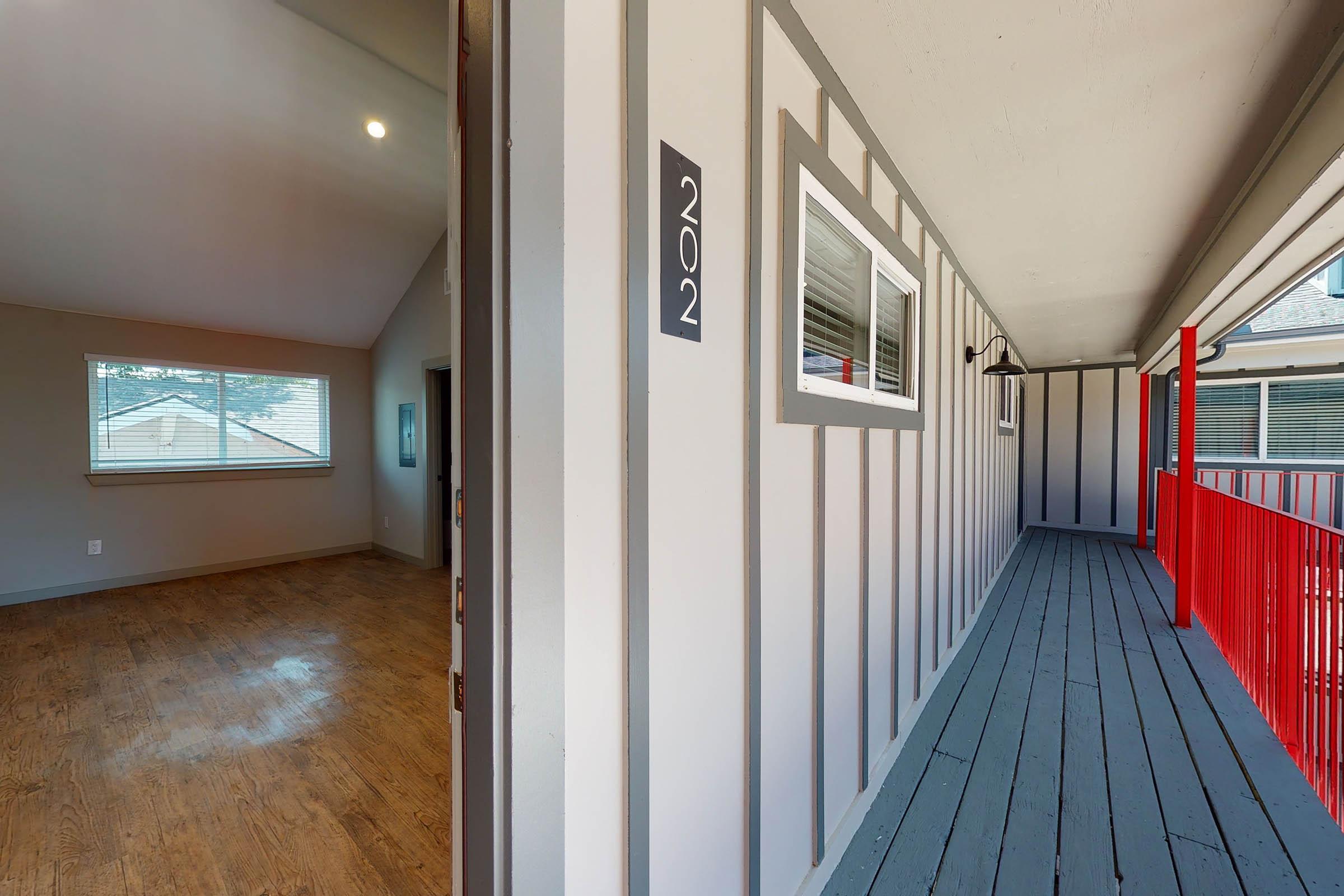 wooden walkway to an apartment