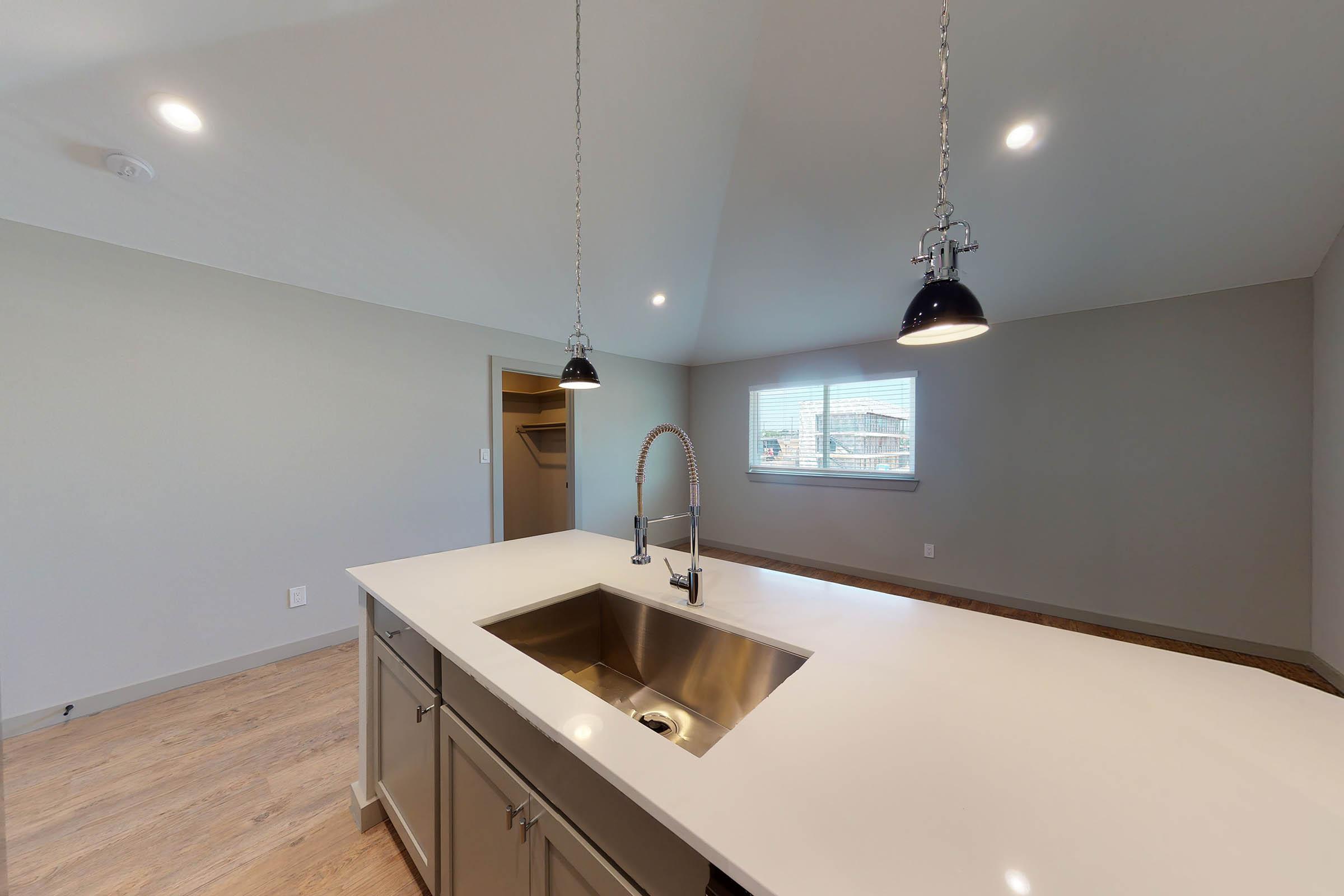 kitchen with a white island countertop