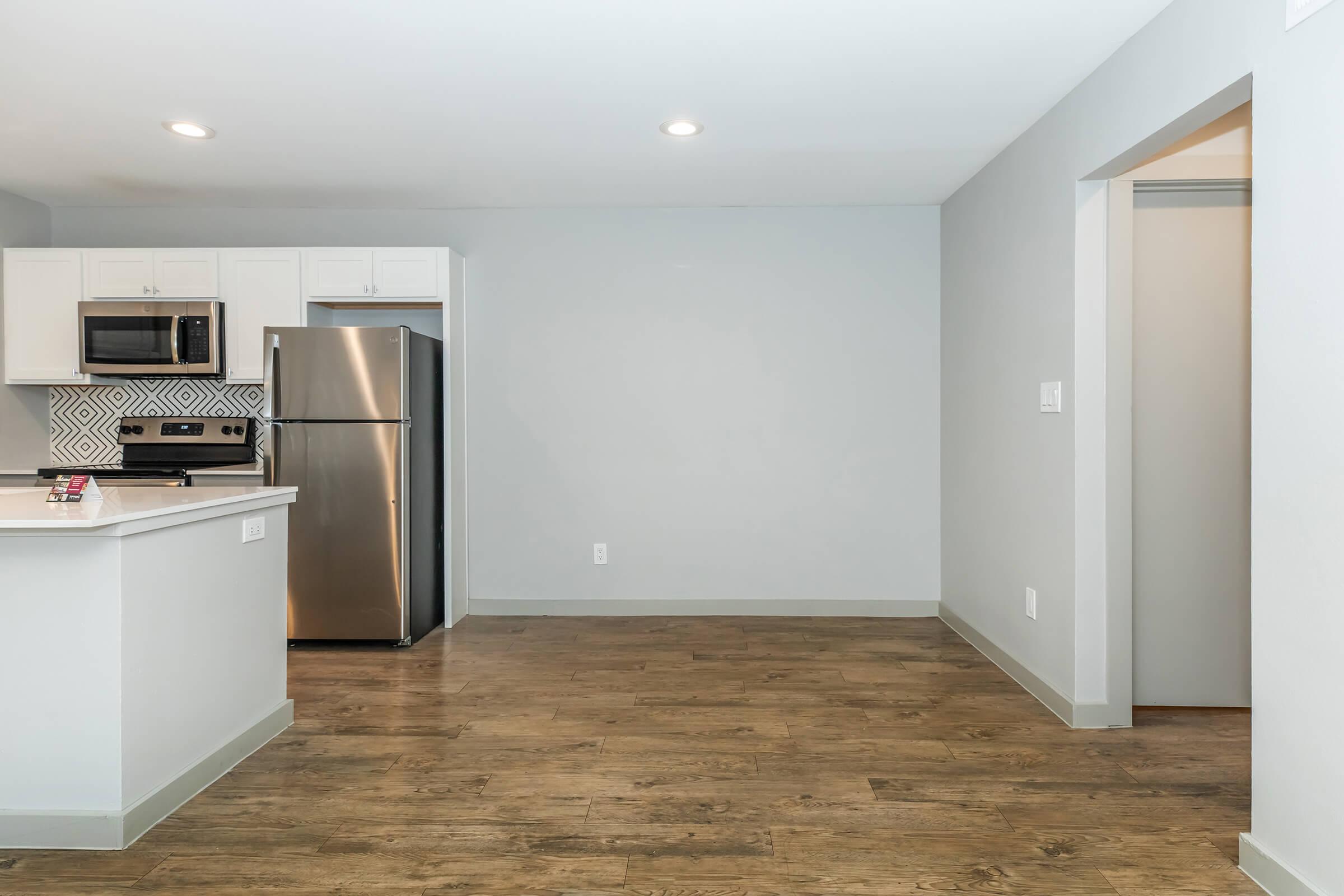 a stainless steel refrigerator in a kitchen