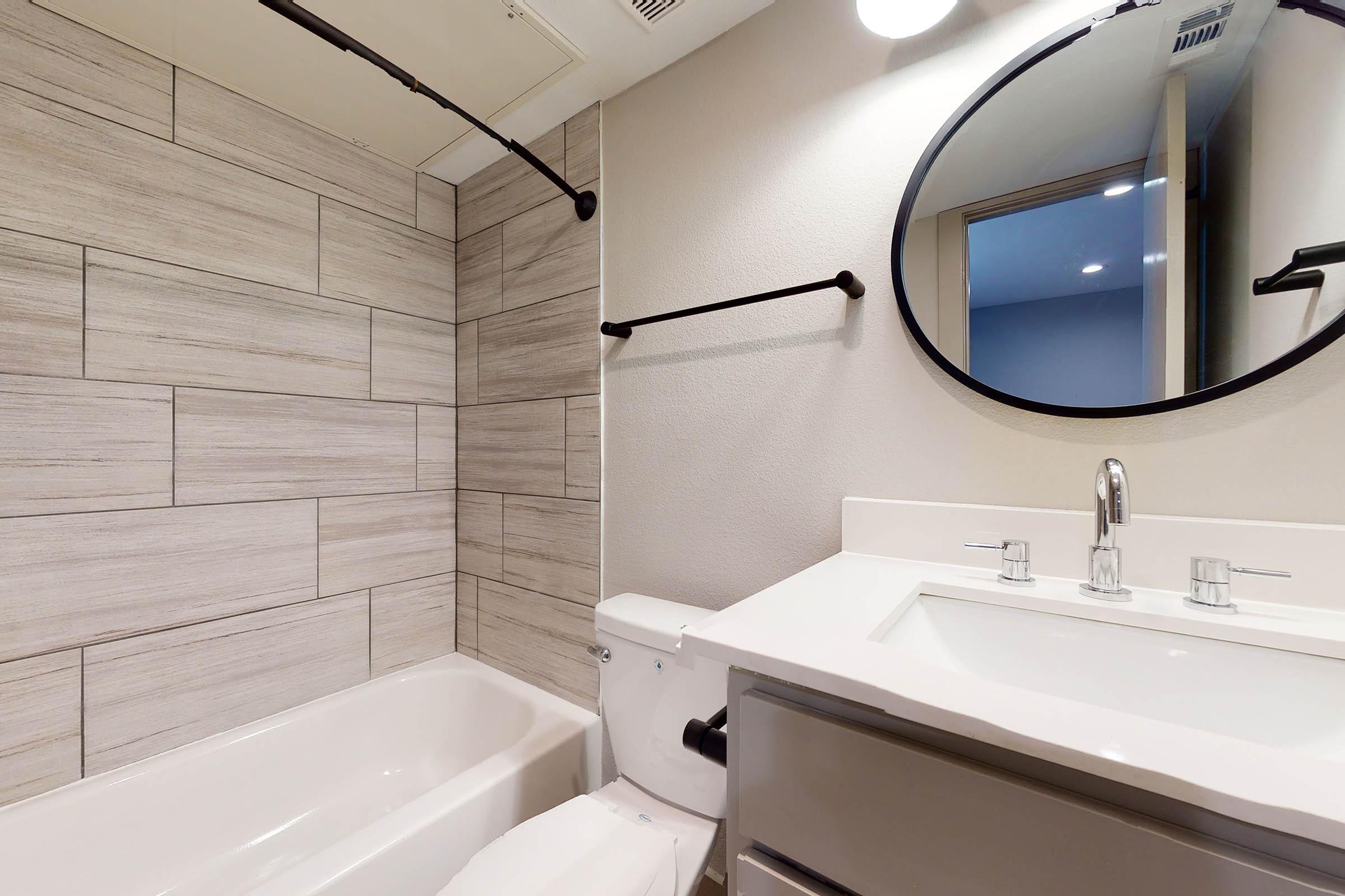 an unfurnished bathroom with a white sink