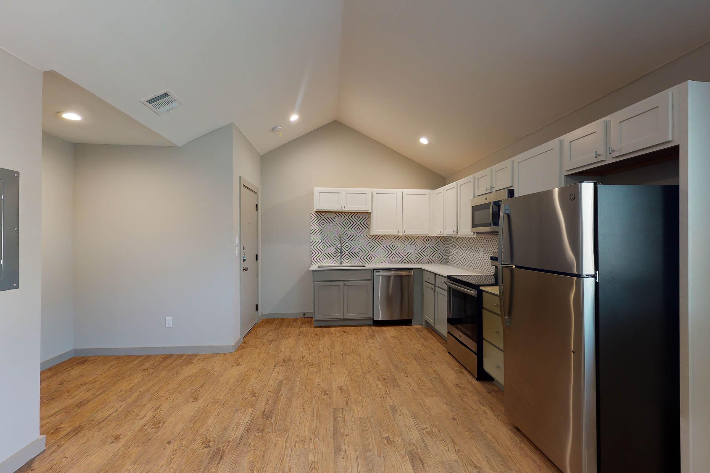 kitchen and dining room with wooden floors