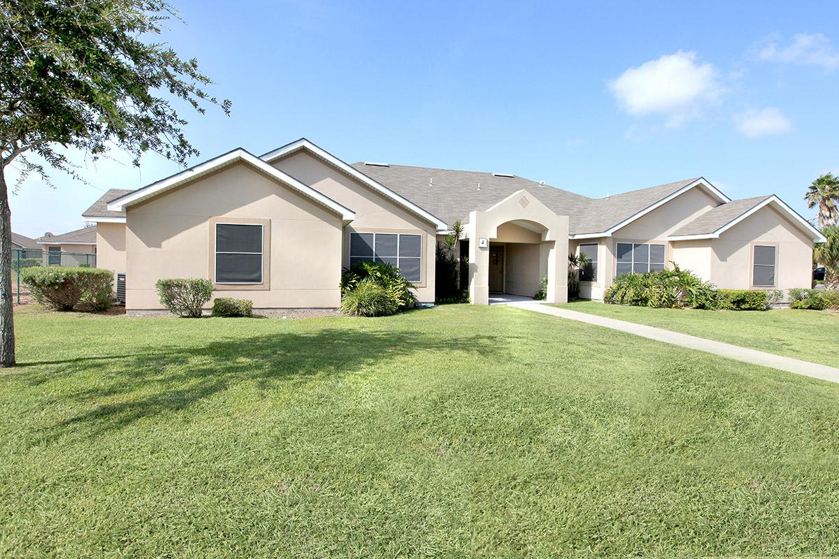 a large lawn in front of a house