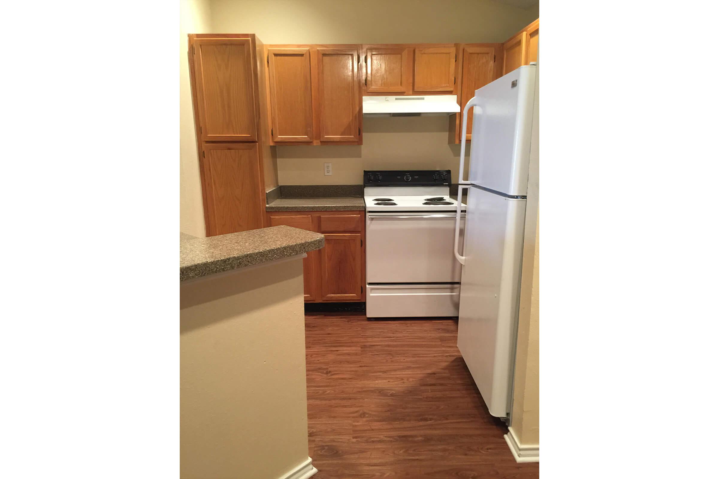 a stainless steel refrigerator in a kitchen