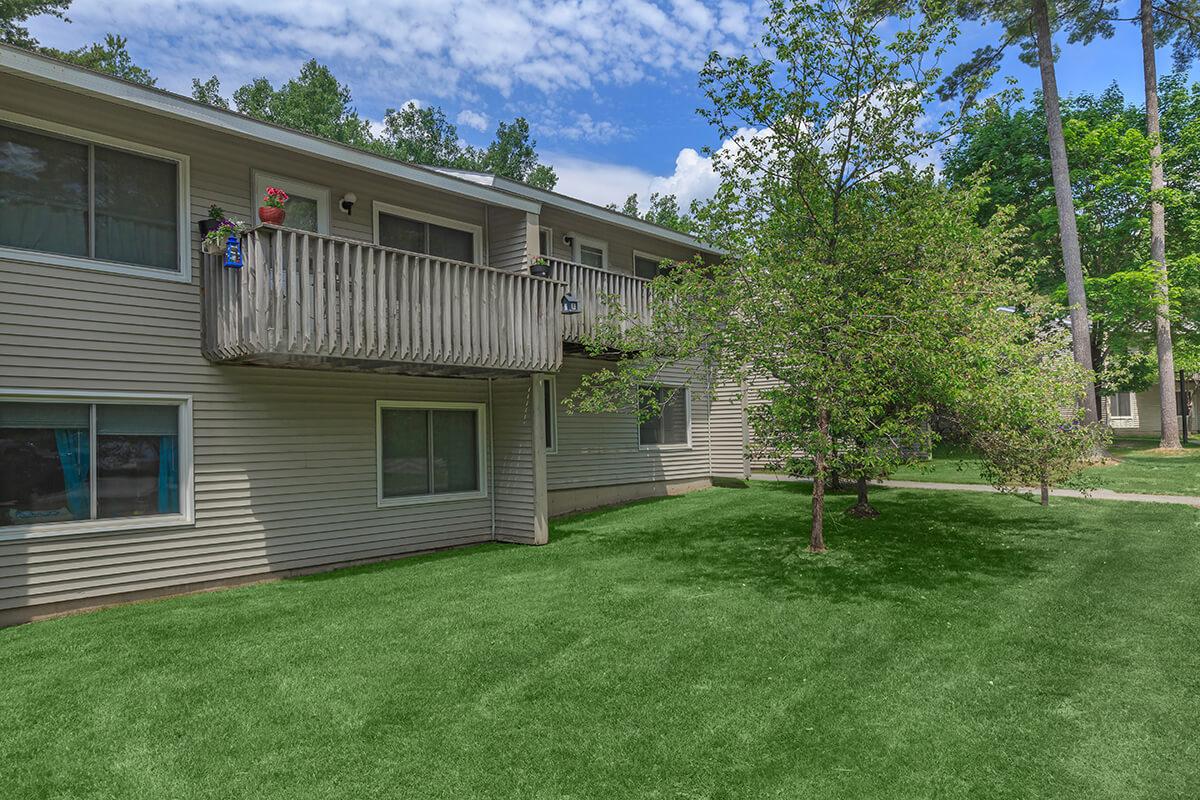 a large lawn in front of a house