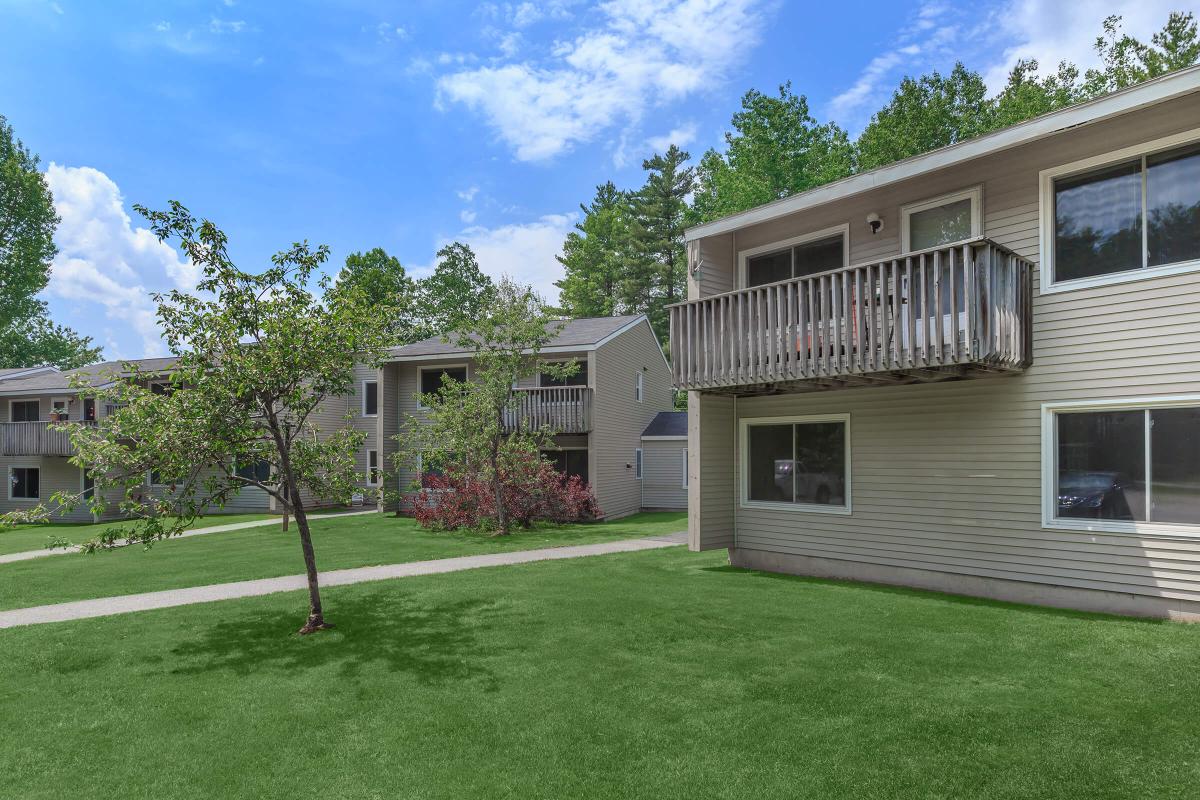 a large lawn in front of a house