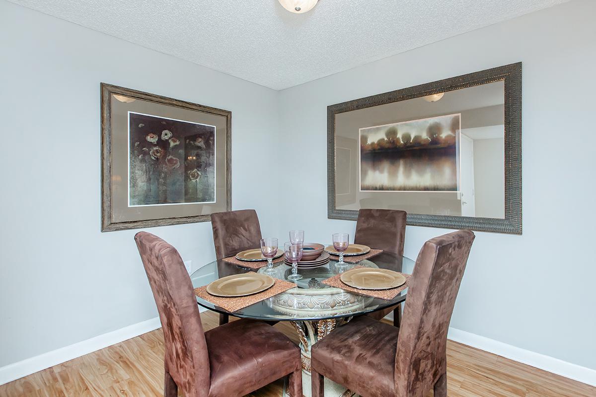 a living room with a leather chair