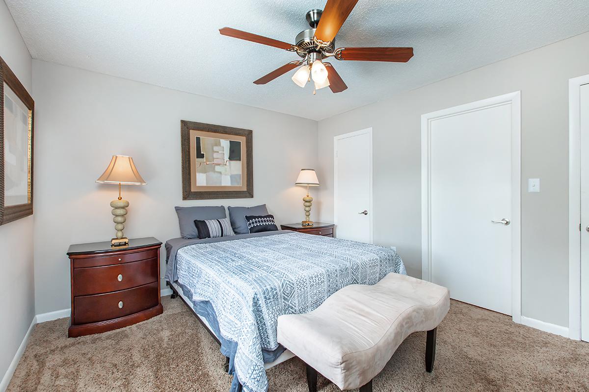 a bedroom with a bed in a hotel room