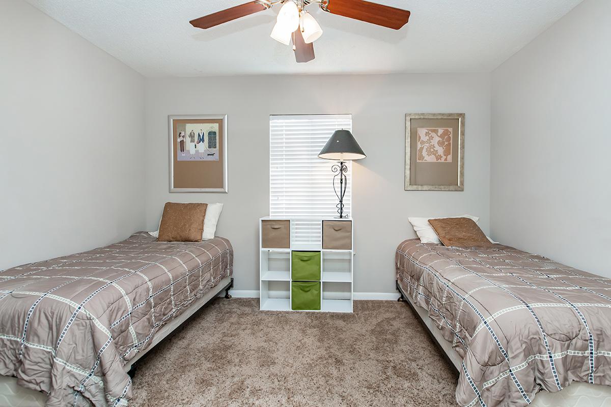 a bedroom with a bed in a hotel room