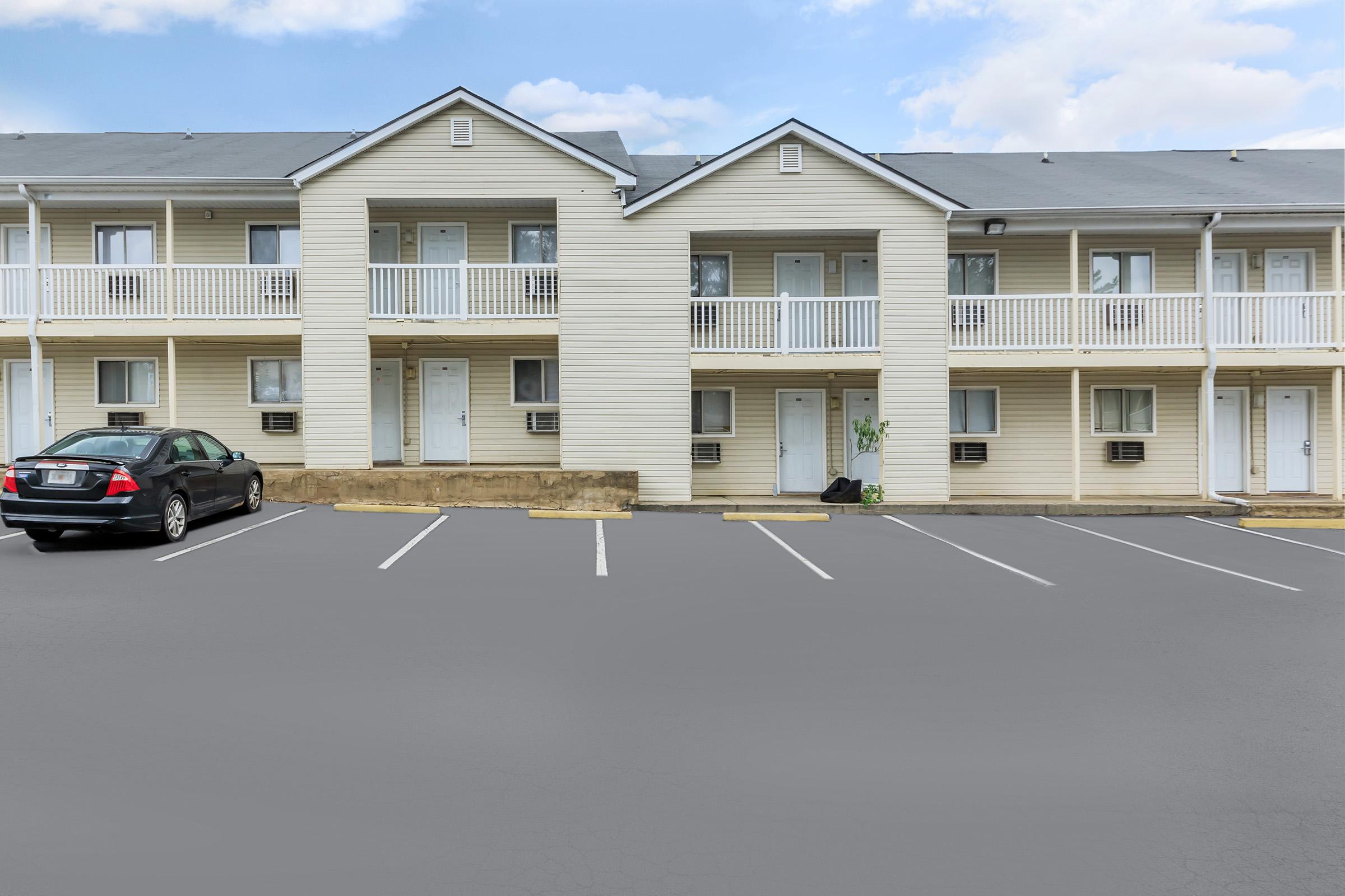 a parking lot in front of a building