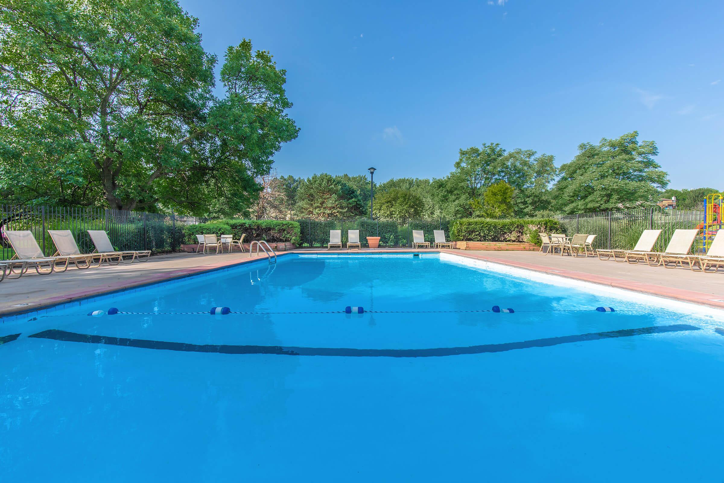 TWO SHIMMERING SWIMMING POOLS