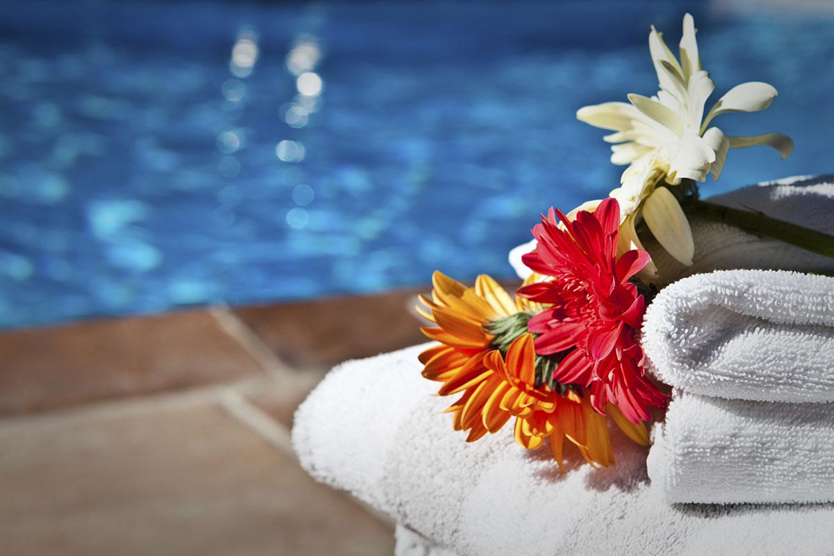 a vase of flowers sitting on a table