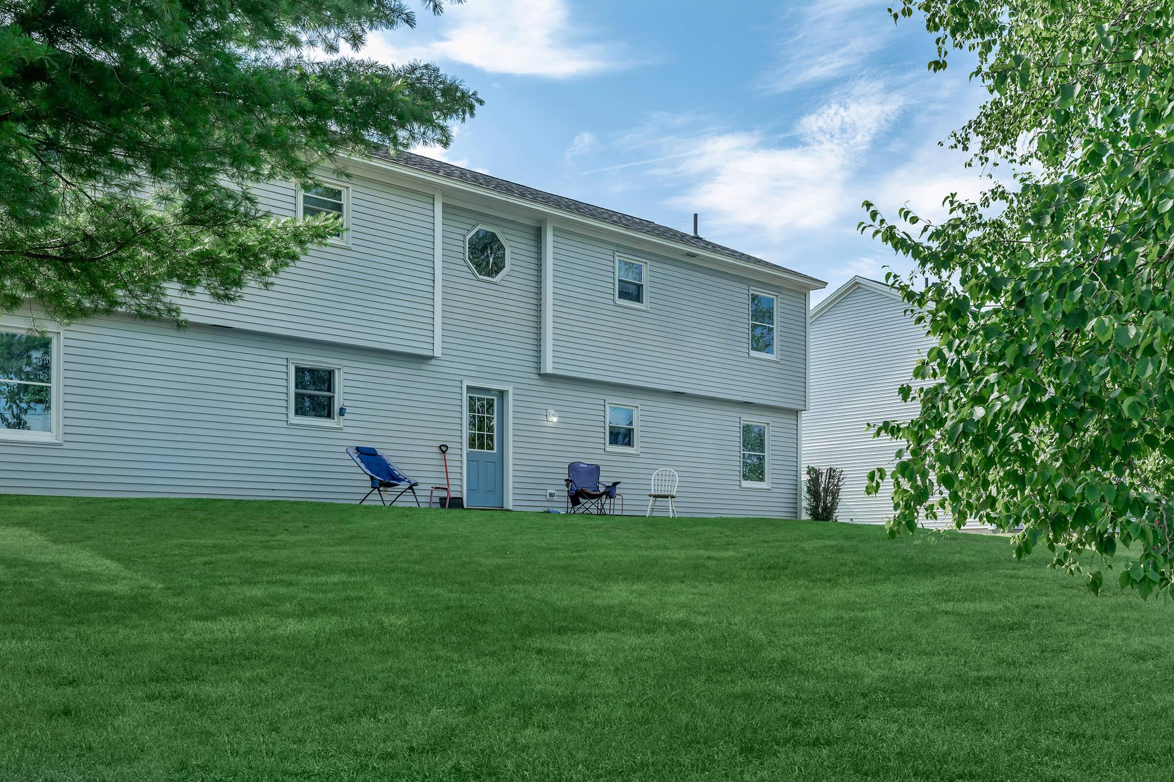 a large lawn in front of a house