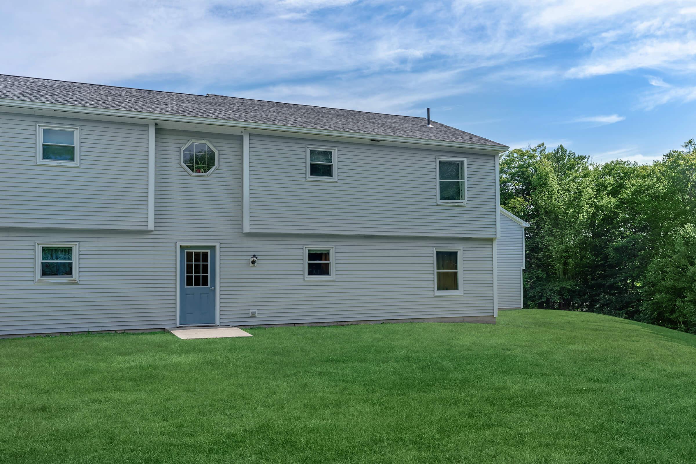 a large lawn in front of a house