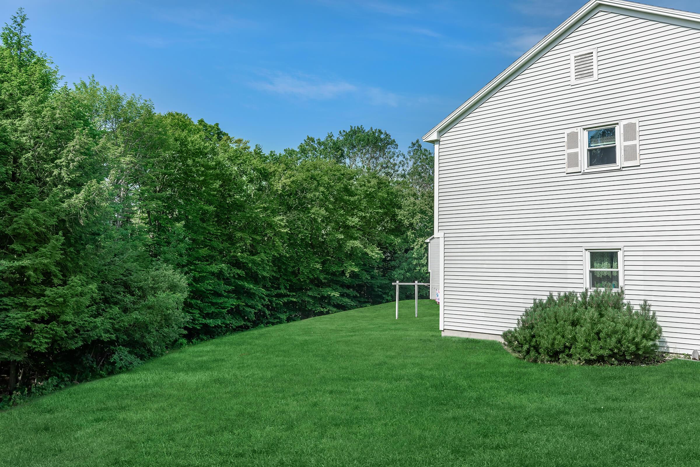 a large lawn in front of a house