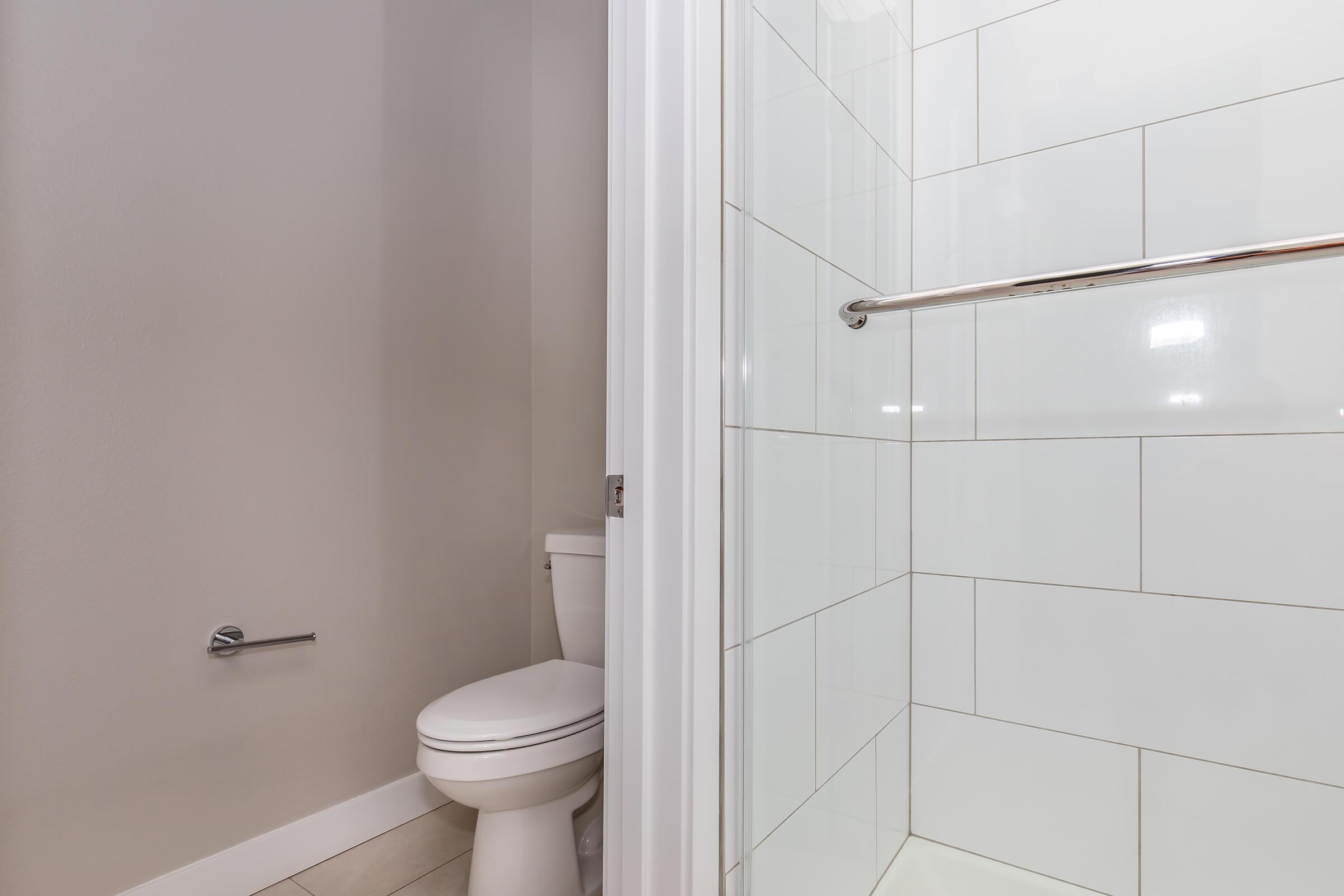 a close up of a shower in a small room