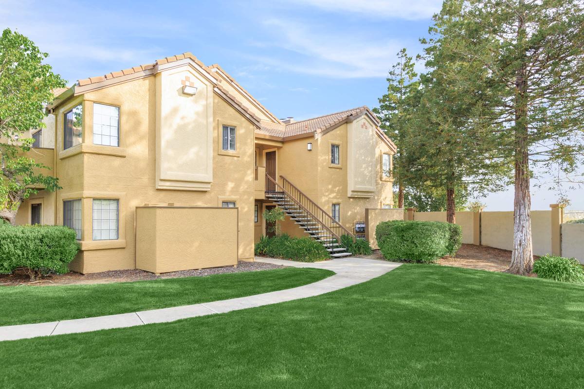 a large lawn in front of a house