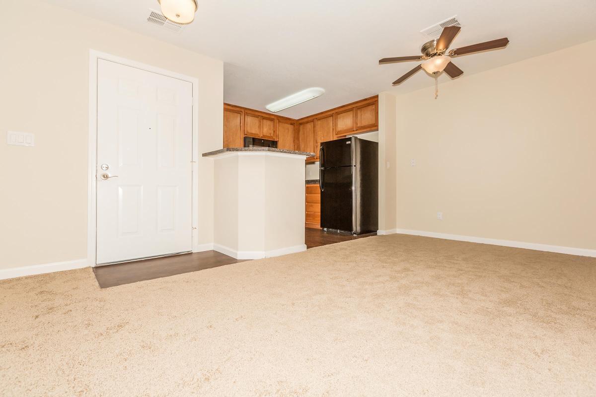 a large white refrigerator in a kitchen