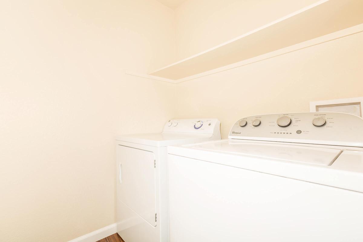 a white refrigerator freezer sitting in a room