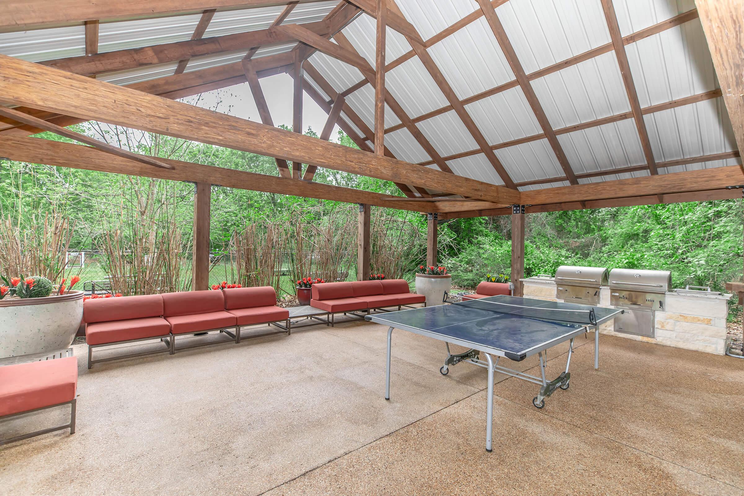 Fire up the grill, challenge a friend to a ping pong match, or just kick back and relax in the shade—this covered outdoor lounge is the perfect place to hang out, unwind, and make the most of your day.