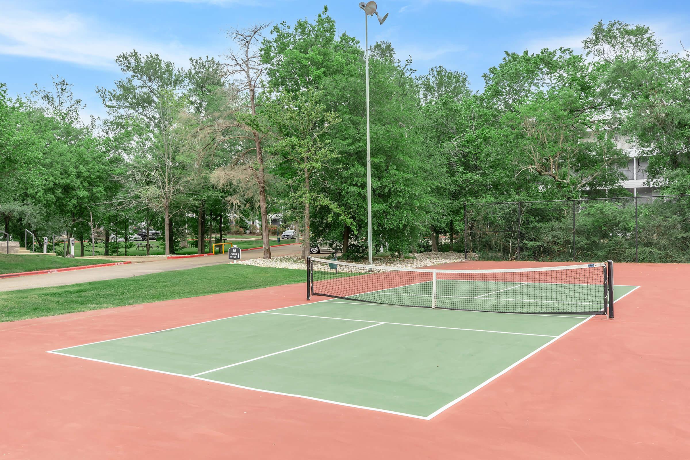 Ready to rally? This court is perfect for a fast-paced game of pickleball! Whether you're a seasoned player or just picking up a paddle, it’s a fun way to stay active and enjoy the outdoors with friends or neighbors.