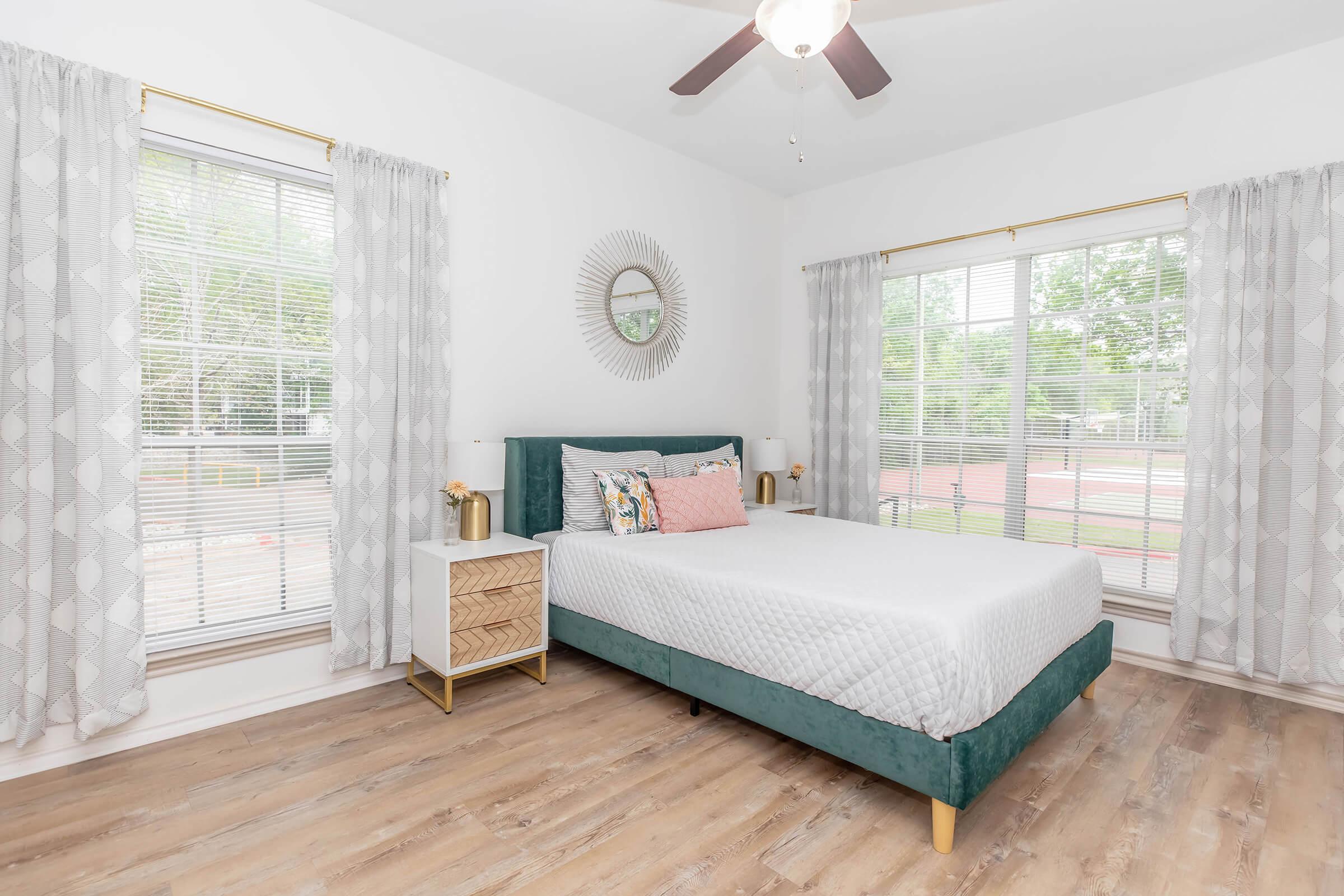 Wake up refreshed in this bright and airy bedroom, filled with natural light from oversized windows and peaceful views. It’s the perfect space to relax, recharge, and make your own.
