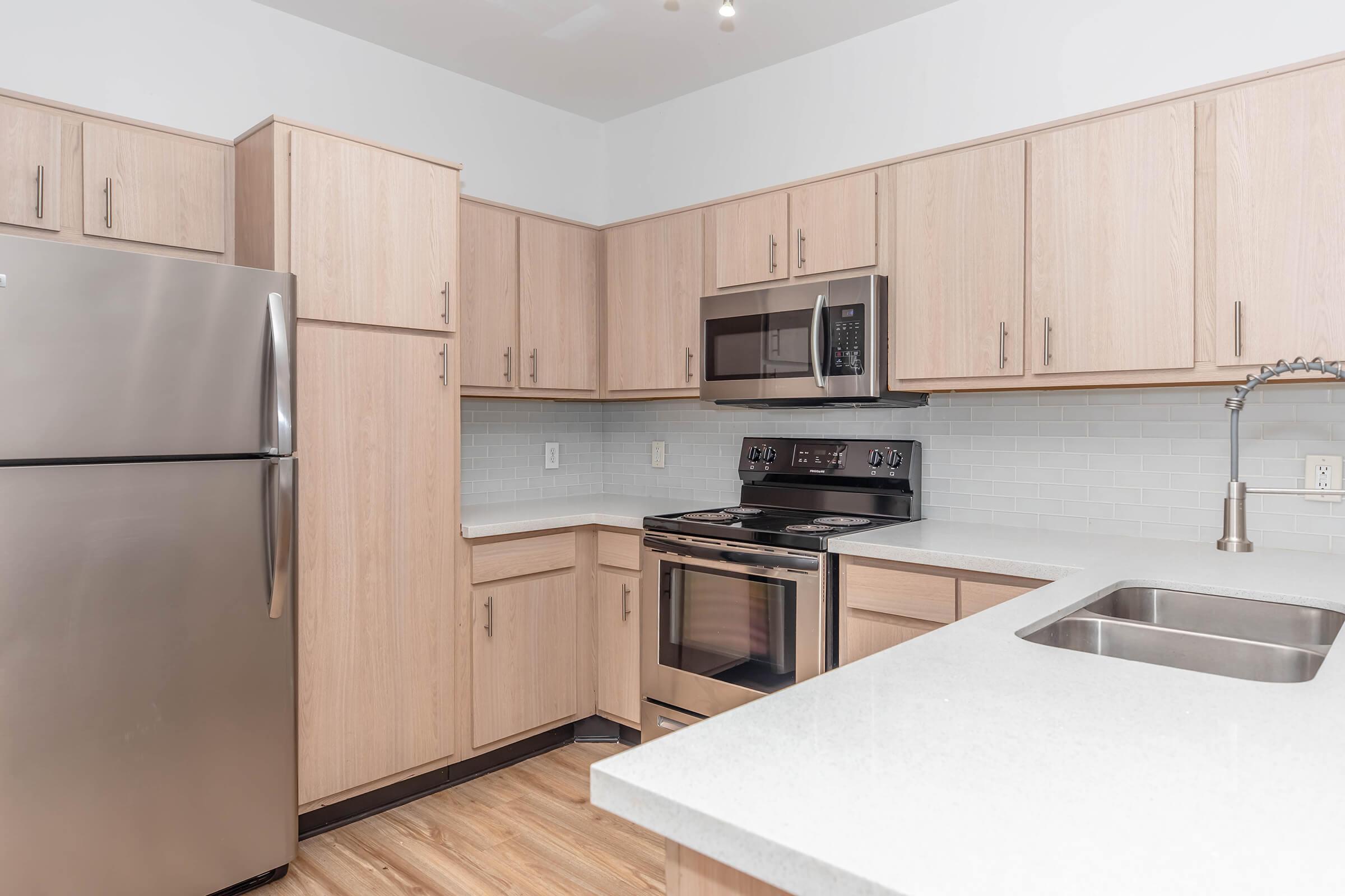 Spacious Kitchen with Stainless Steel Appliances