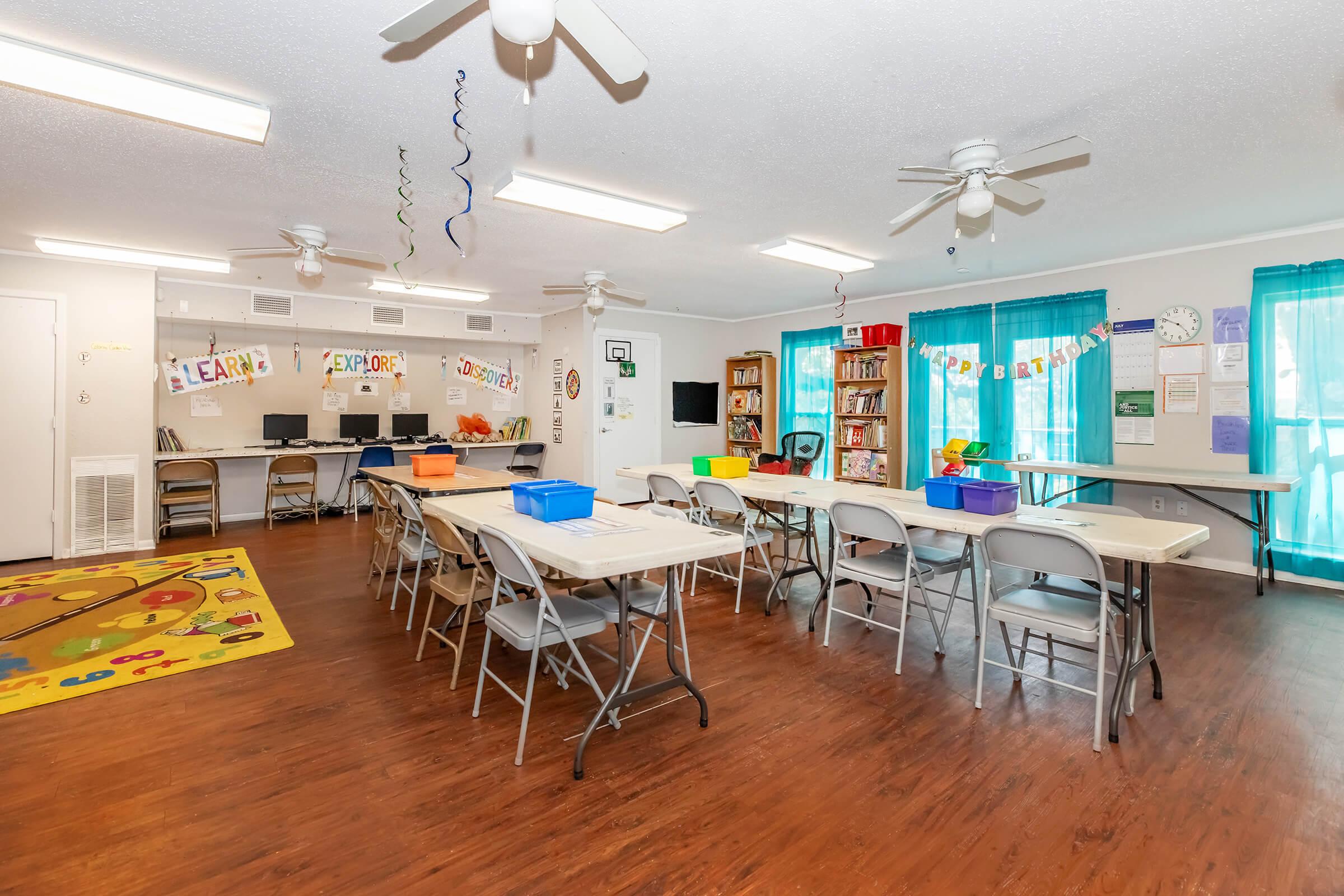 a room filled with furniture and a table