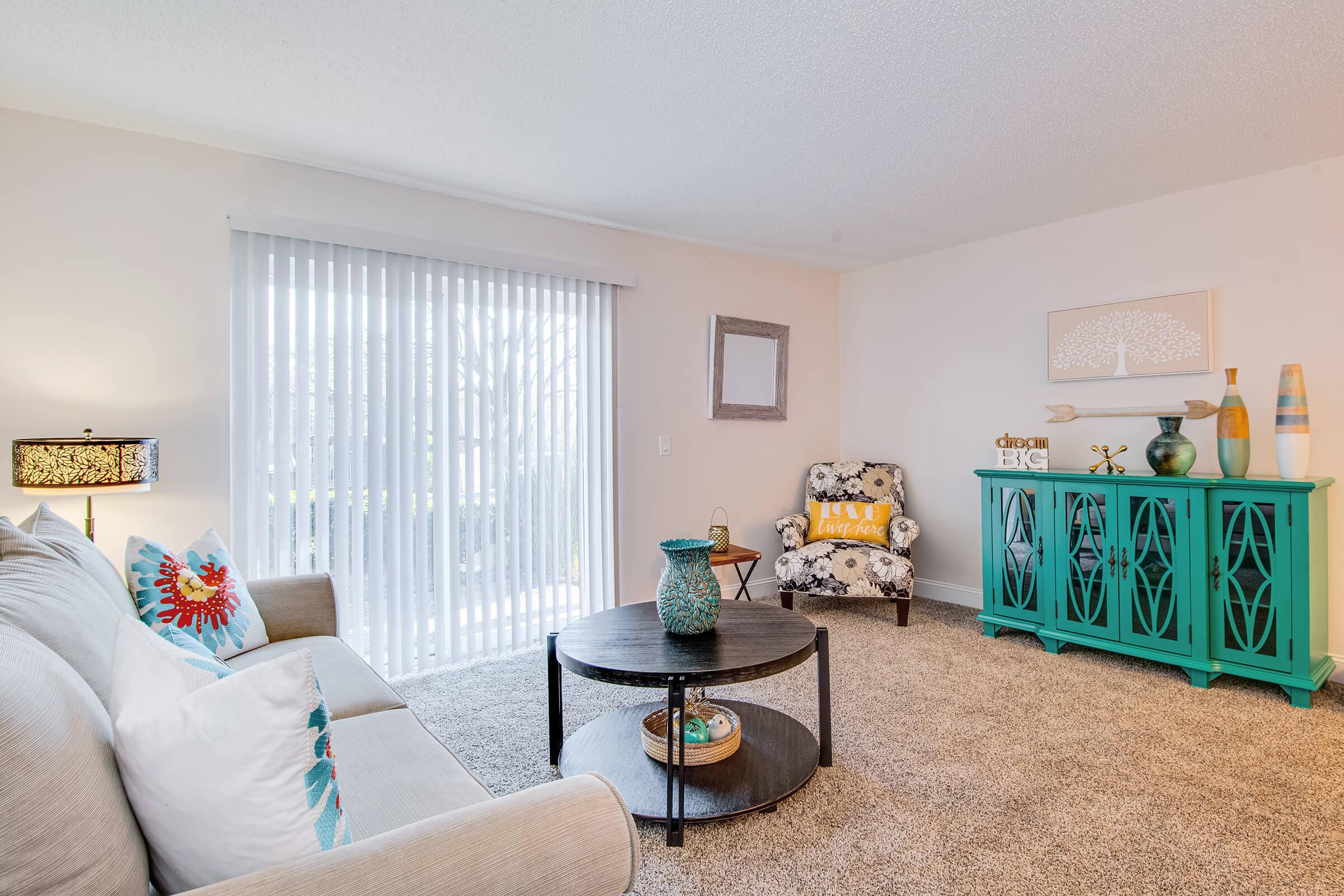 Cozy living room at Nob Hill Apartments in Nashville, Tennessee.