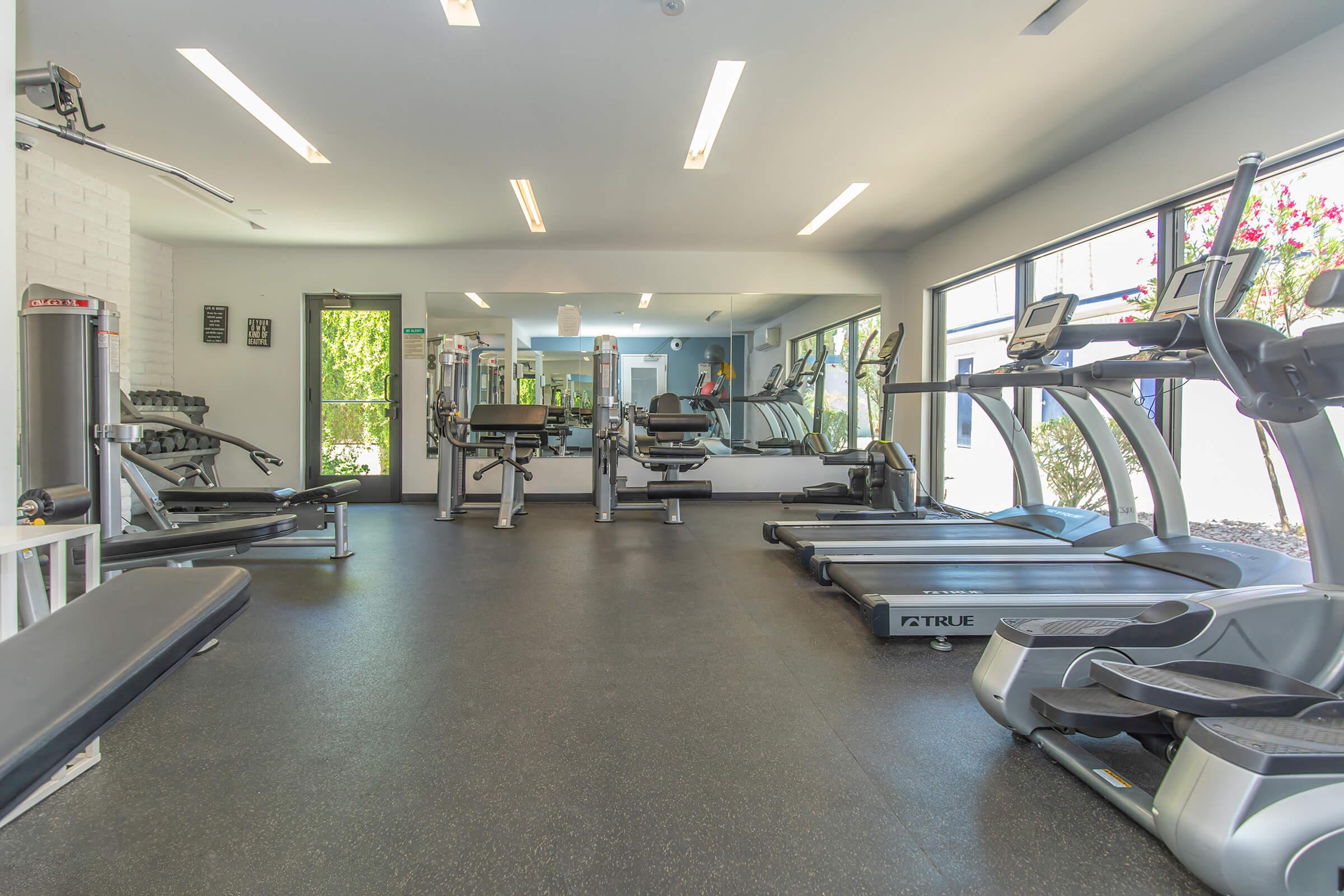 Modern fitness center with workout gym equipment