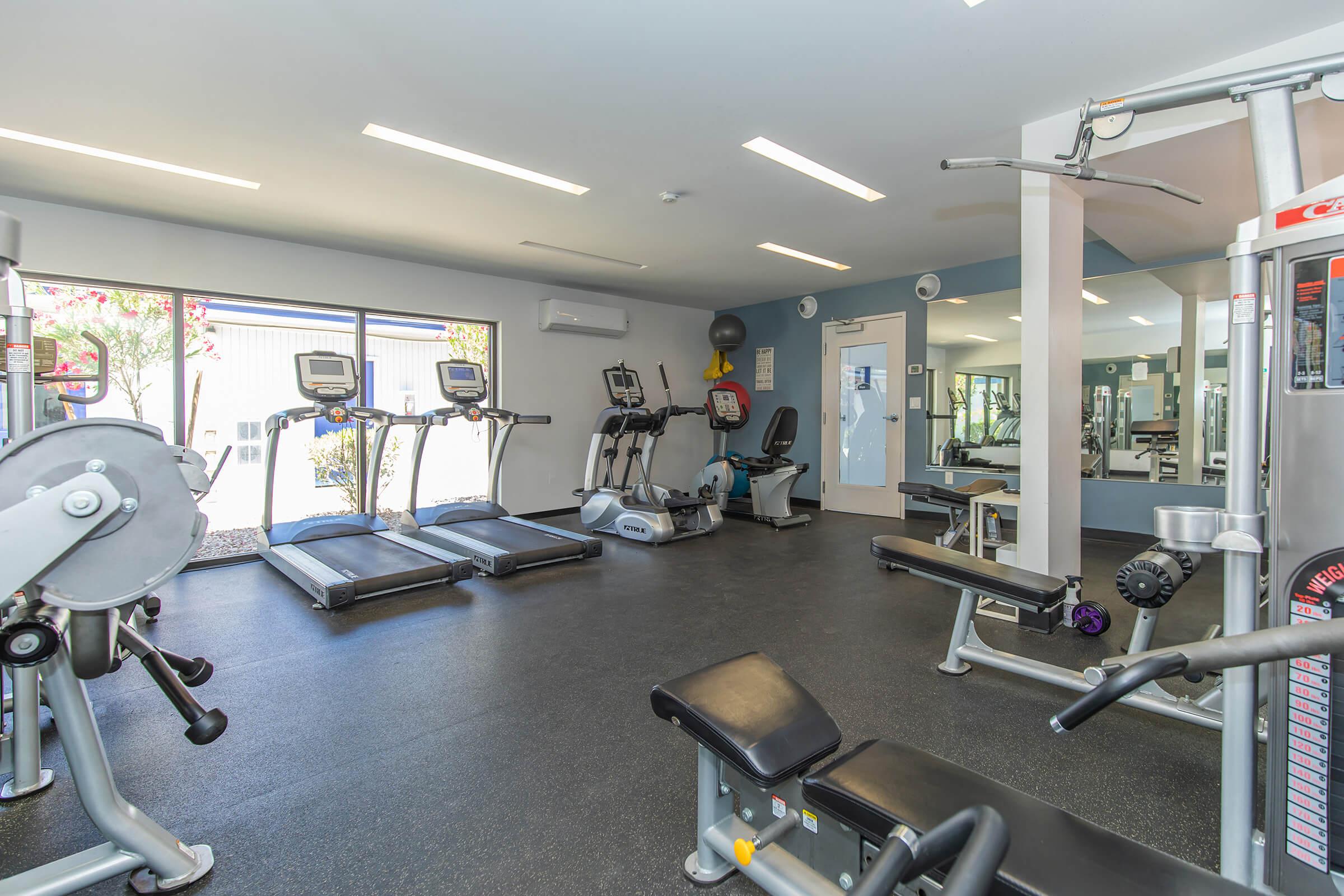 Rise Biltmore's modern fitness center gym with workout equipment in Phoenix, AZ