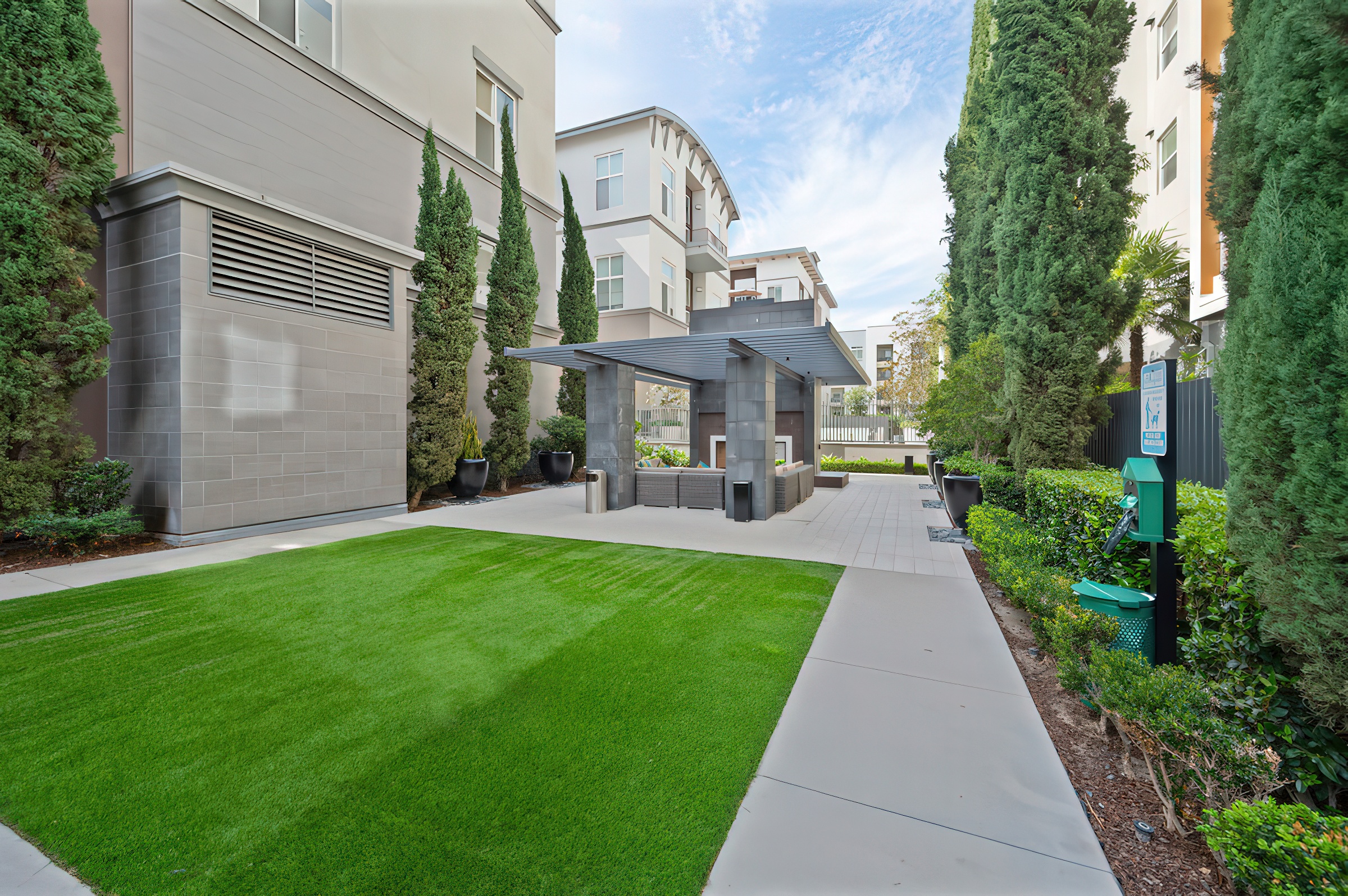 view of grass with a walkway