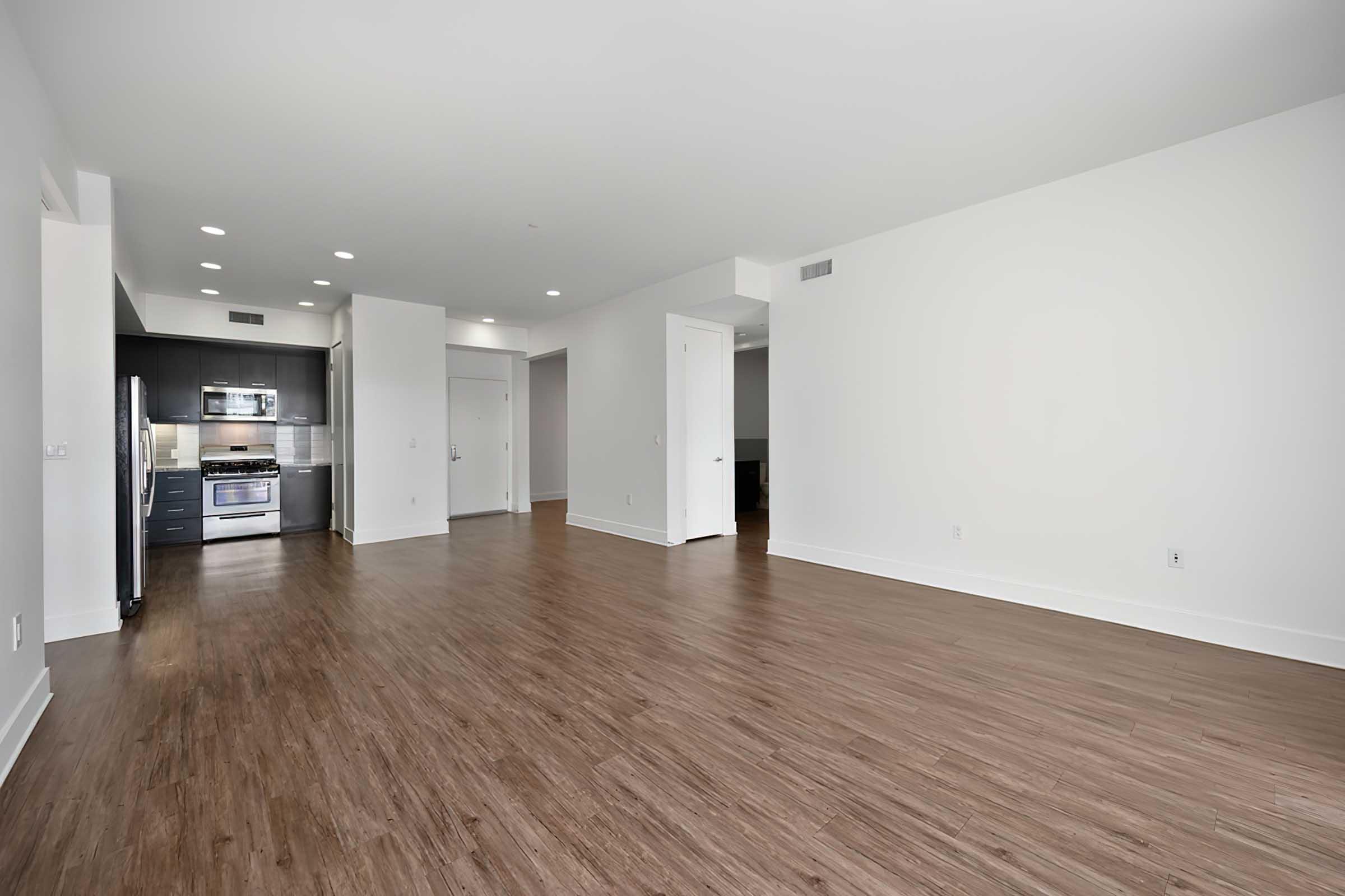 a large room with wood floors